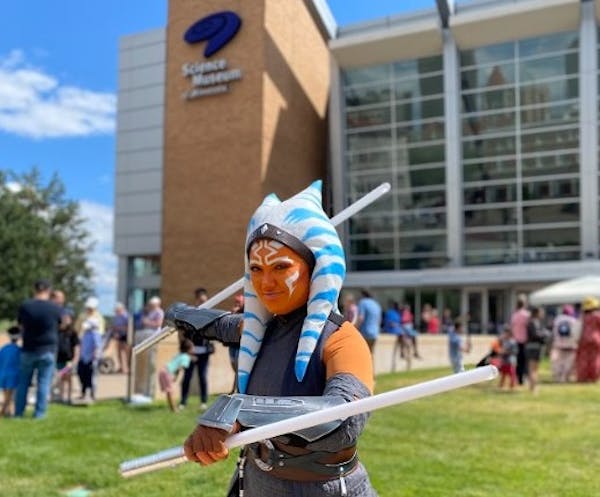 An Ahsoka Tano cosplayer volunteers at the Science Museum of Minnesota. The St. Paul museum hosts Star Wars Day every year.