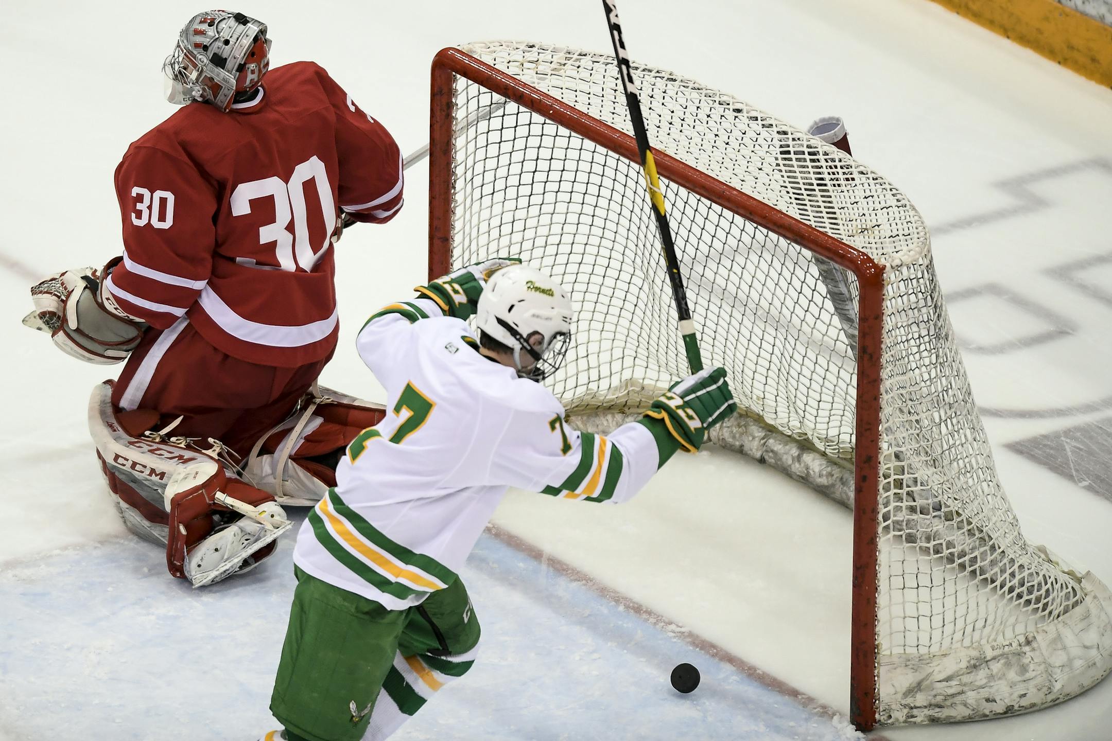 Edina forward Liam Malmquist (7) celebrated after teammate forward Mason Nevers (18) scored a goal against Benilde-St. Margaret's goaltender Carson Limesand (30) in the second period, giving the Hornets a 1-0 lead. ] Aaron Lavinsky ¥ aaron.lavinsky@startribune.com Edina played Benilde-St. Margarets in the Class 2A, Section 6 boysÕ hockey section final on Wednesday, Feb. 27, 2019 at Mariucci Arena in Minneapolis, Minn.