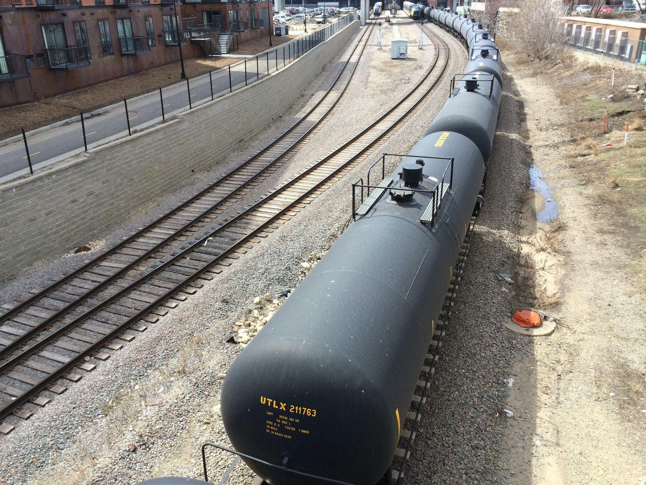 Tank cars moved slowly past Target Field and through Minneapolis' Warehouse District on a recent spring day.