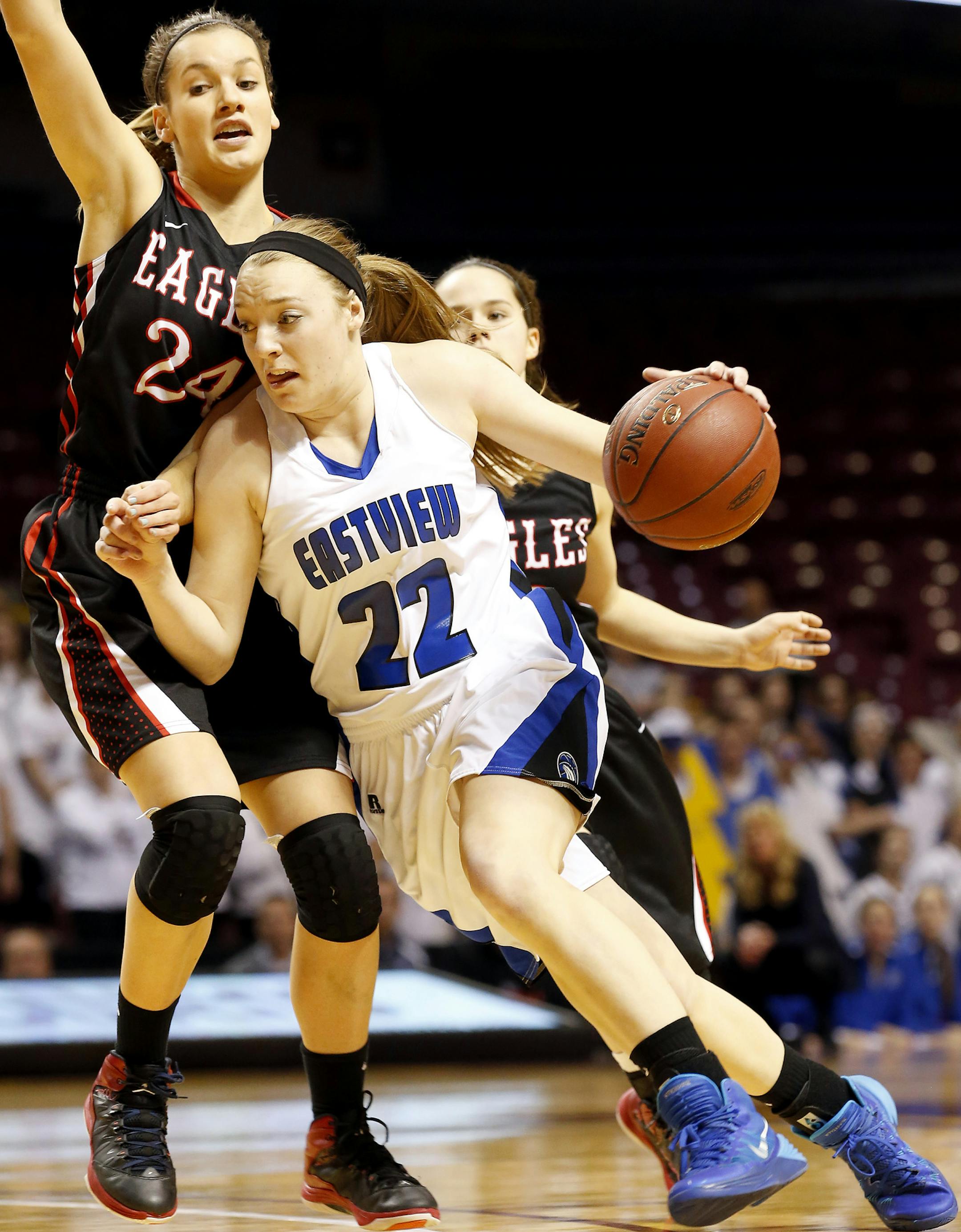 Madison Guebert (22) of Eastview was defended by Martha Kuderer (24) of Eden Prairie fought in the first half. ] CARLOS GONZALEZ cgonzalez@startribune.com - March 20, 2014 , Minneapolis, Minn., Williams Arena, Class 4A girls' basketball semifinals, Eastview vs. Eden Prairie, 6 p.m.;