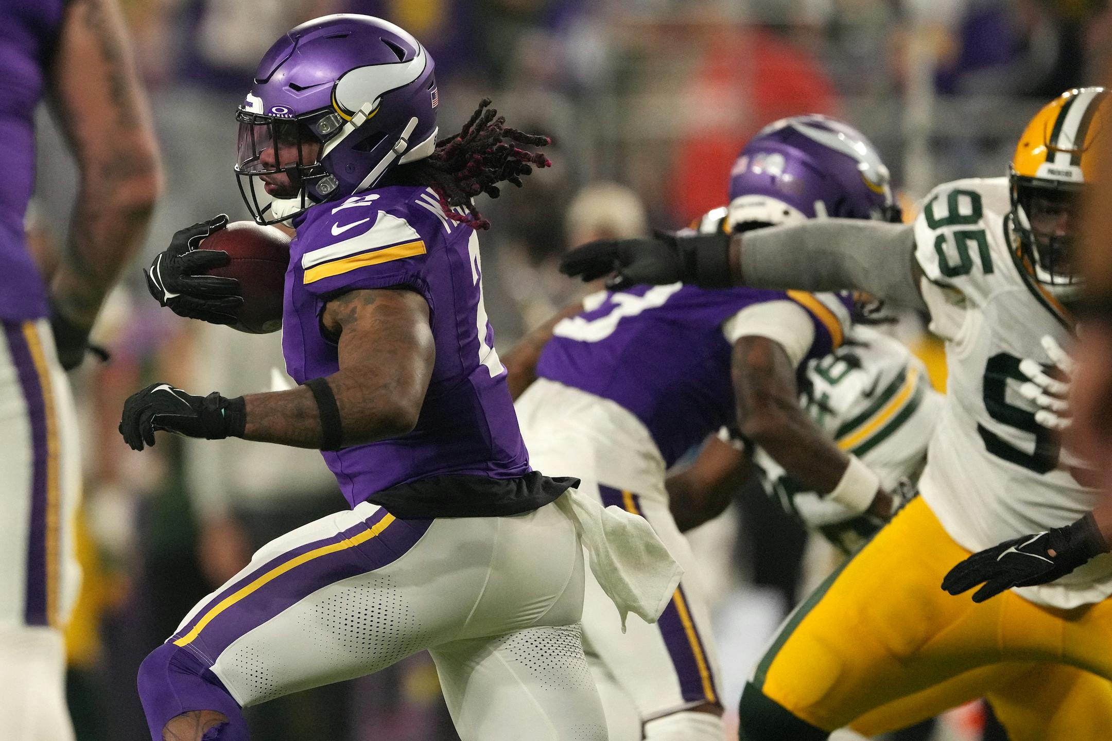 Minnesota Vikings running back Alexander Mattison (2) rushes the ball in the third quarter of an NFL game between the Minnesota Vikings and the Green Bay Packers Sunday, Dec. 31, 2023 at U.S. Bank Stadium in Minneapolis. ] ANTHONY SOUFFLE • anthony.souffle@startribune.com