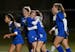 Holy Angels forward Ciara McCrory (2), left of center, hugged midfielder Hailey VonSee (22) after VonSee scored a goal against Cloquet-Carlton in the 