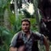Chris Pratt runs from a dino in "Jurassic World."