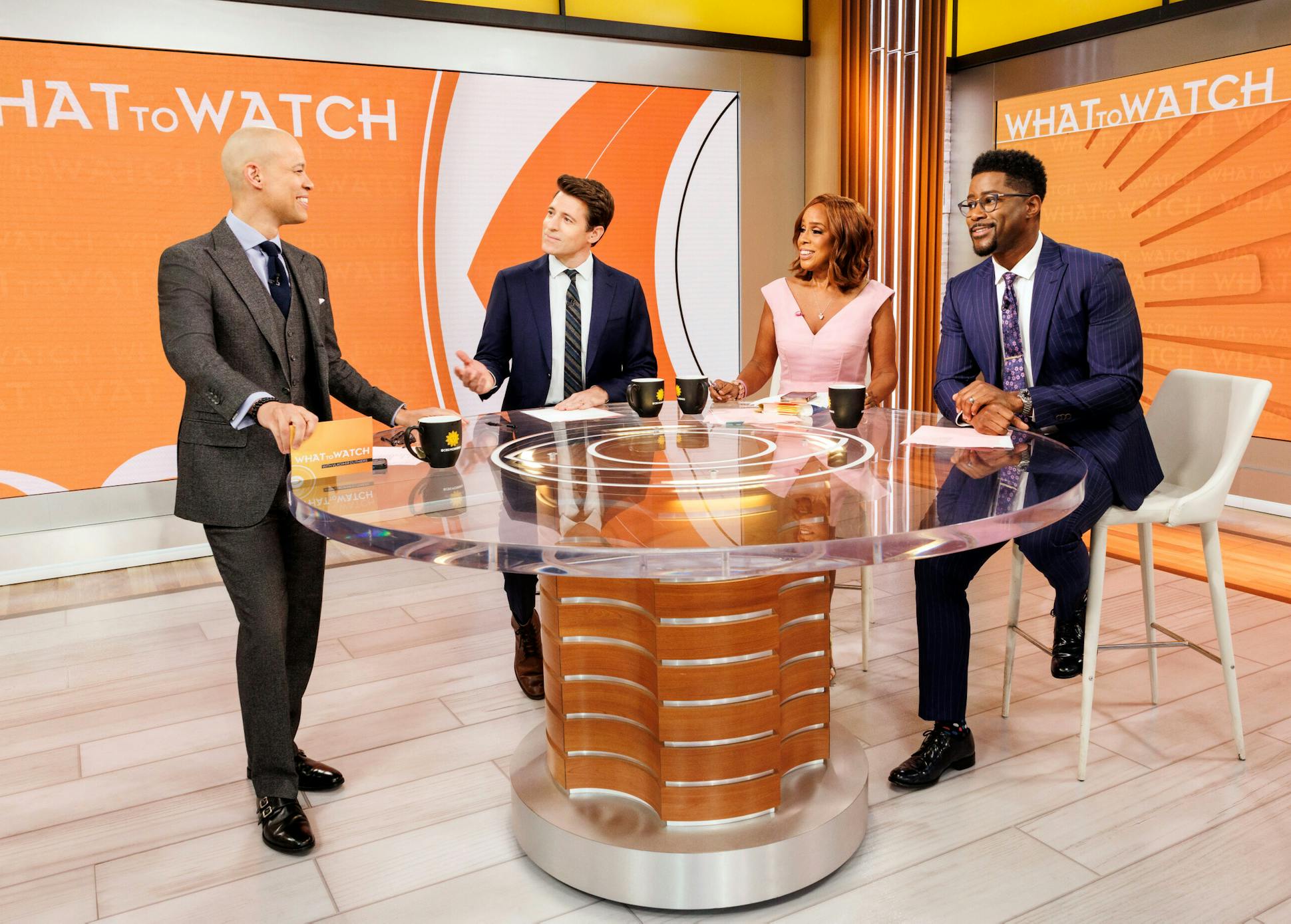 “CBS Mornings” co-hosts Tony Dokoupil and Gayle King, center, joined Nate Burleson, right, with anchor and correspondent Vladimir Duthiers at left.