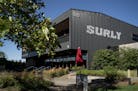 Surly Brewing Co., operator of the state's largest beer hall, is closing that beer hall, the adjacent pizza restaurant and retail shop in early Novemb