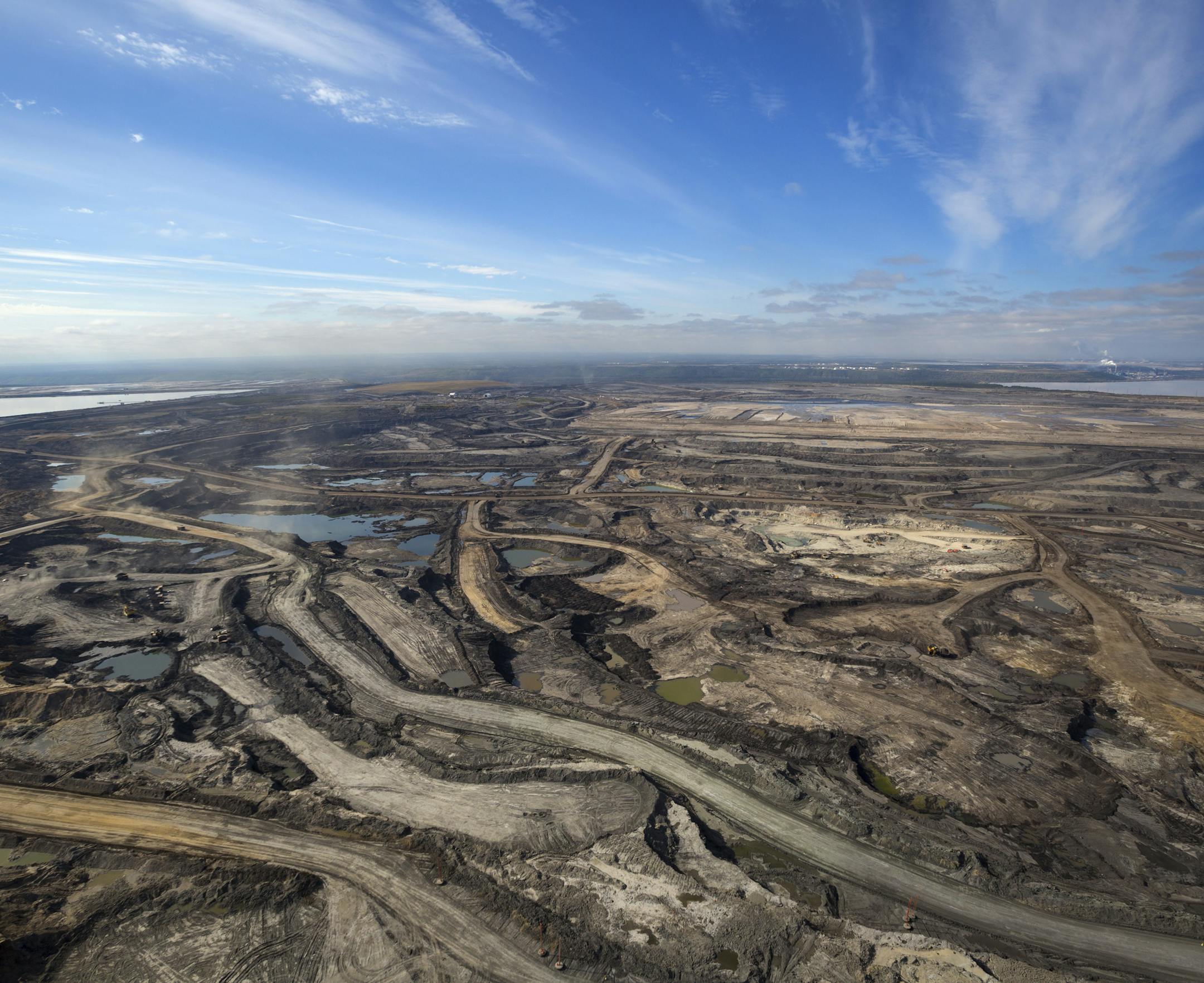 Expansive aerial view of a pit mining project in Alberta's Oilsands near Fort McMurray.