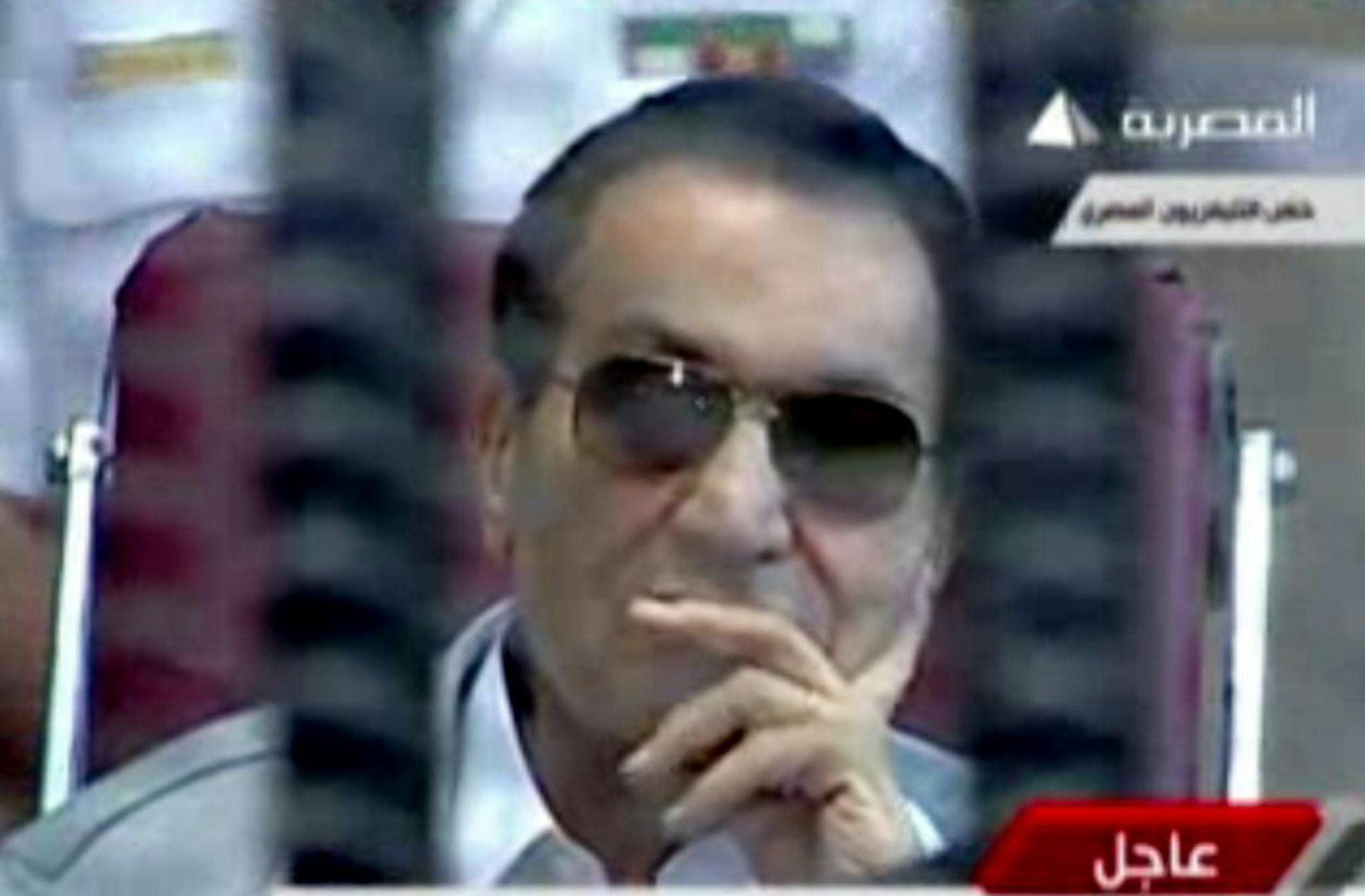 This image made from video broadcast on Egyptian state television shows former President Hosni Mubarak inside the defendant's cage in a courtroom in Cairo, Egypt, Saturday, May 11, 2013.