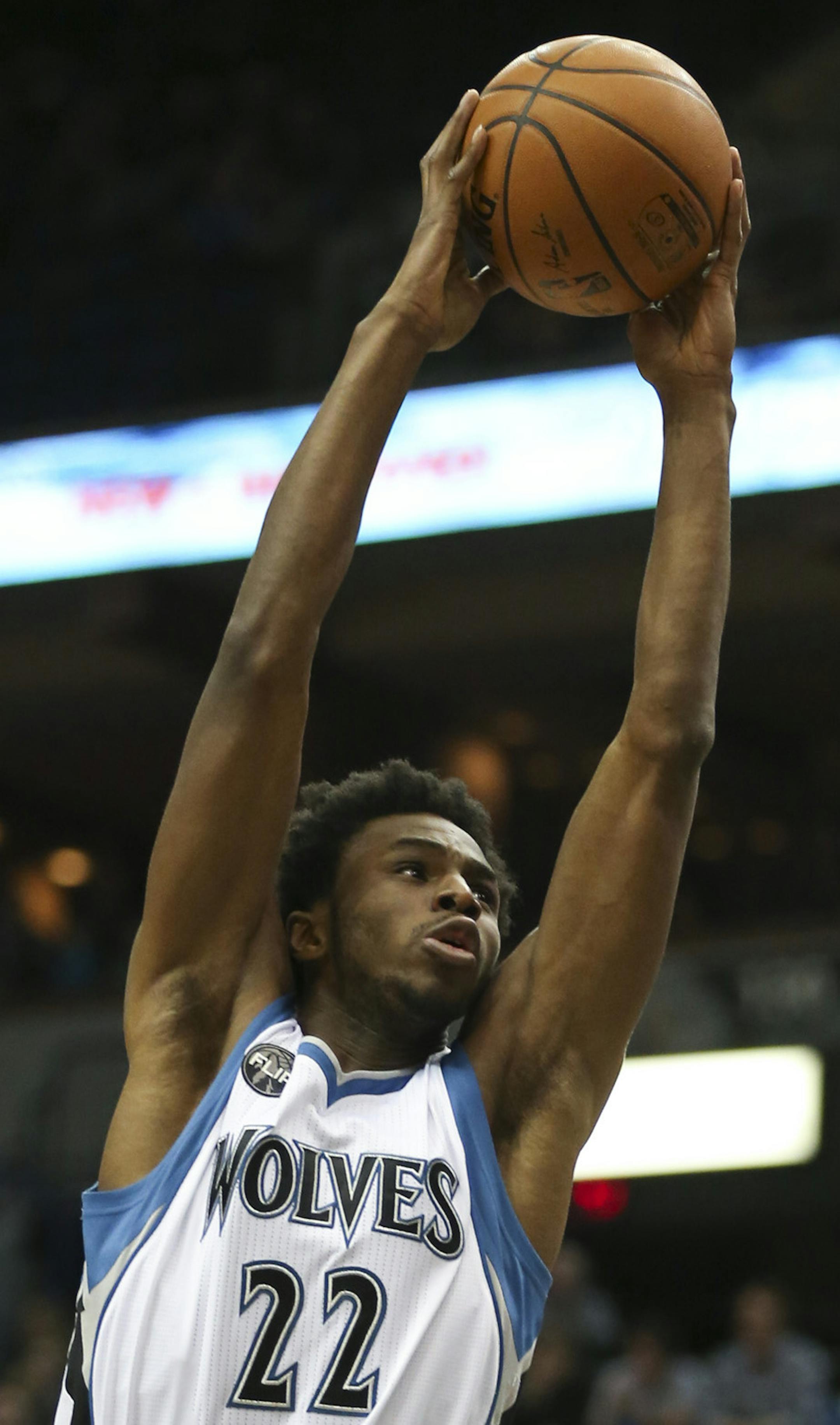 Timberwolves guard Andrew Wiggins dunked over Sacramento Kings forward Quincy Acy in the first quarter Wednesday night. ] JEFF WHEELER ï jeff.wheeler@startribune.com The Minnesota Timberwolves faced the Sacramento Kings in an NBA basketball game Wednesday night, March 23, 2016 at Target Center in Minneapolis.