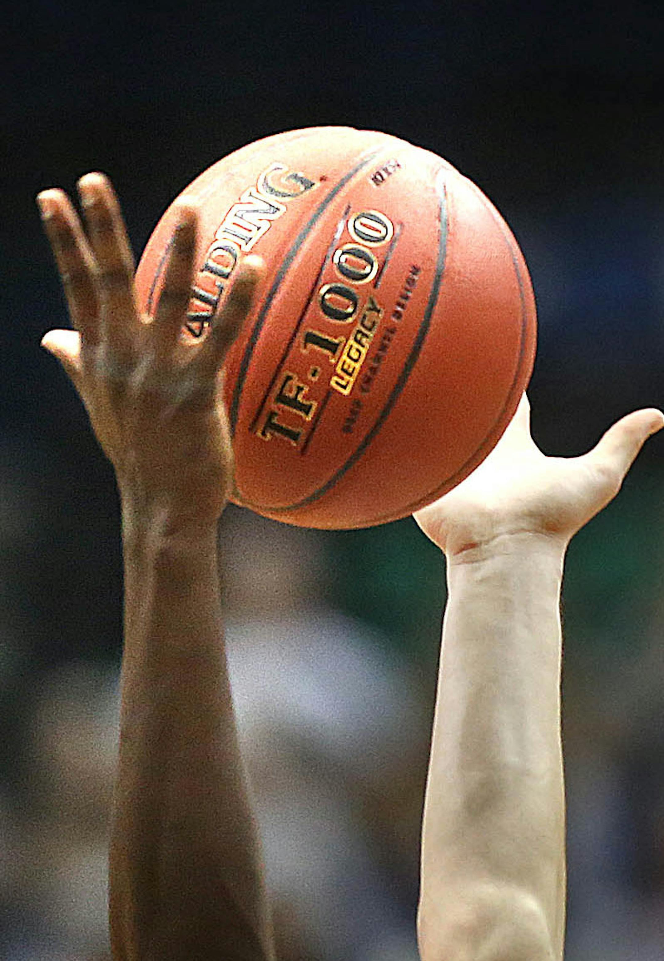 DeLaSalleís Goanar Mar (left) took the opening tip off with Monticelloís Trevor Bautch.] JIM GEHRZ ï james.gehrz@startribune.com / Minneapolis, MN / March 10, 2016 /12:00 and 2:00 PM ñ BACKGROUND INFORMATION: Action and reaction from the semifinals of the Class 3A Boysí 2016 State High School Basketball Tournament at Target Center.Noon: DeLaSalle vs Monticello2 PM: Red Wing vs Fergus Falls