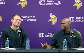 Coach Kevin O'Connell, left, and defensive coordinator Brian Flores face questions at nearly every level of the Vikings defense this offseason.