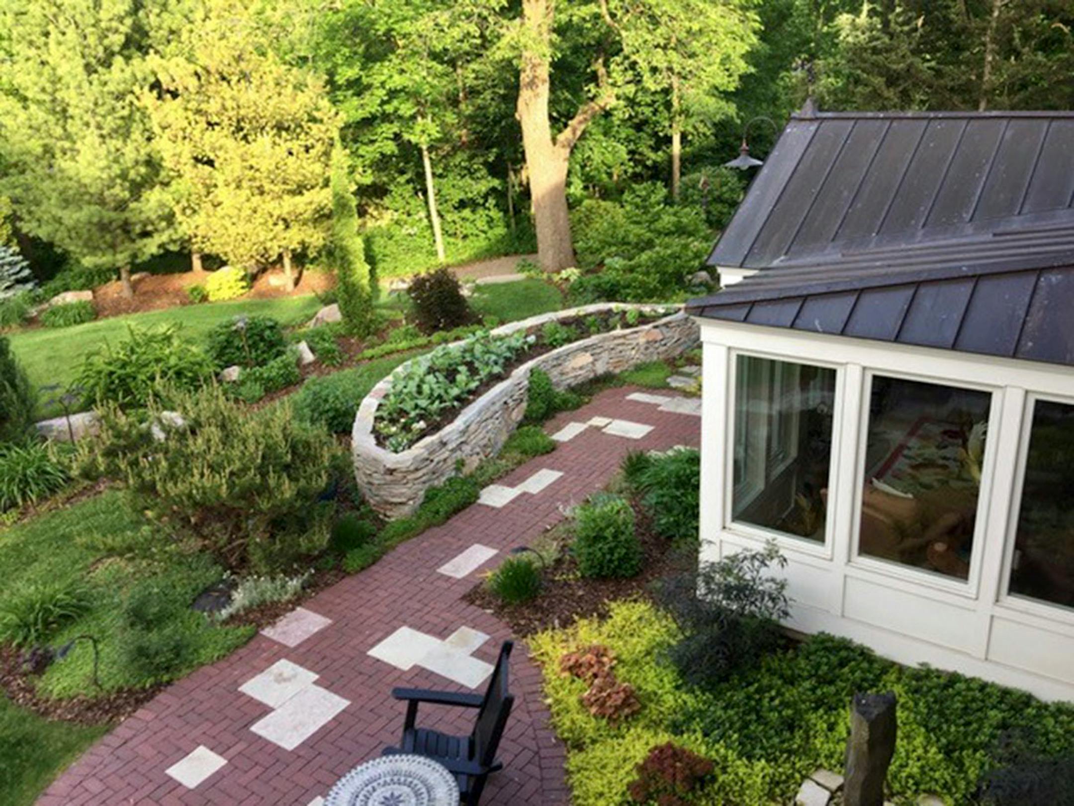 The Koenig garden includes a raised vegetable bed.