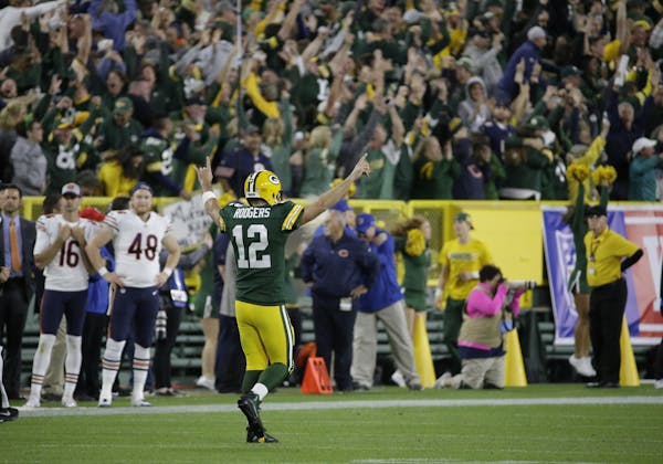 Packers quarterback Aaron Rodgers threw a 75-yard touchdown pass to Randall Cobb during the second half last week, despite a knee injury that knocked 