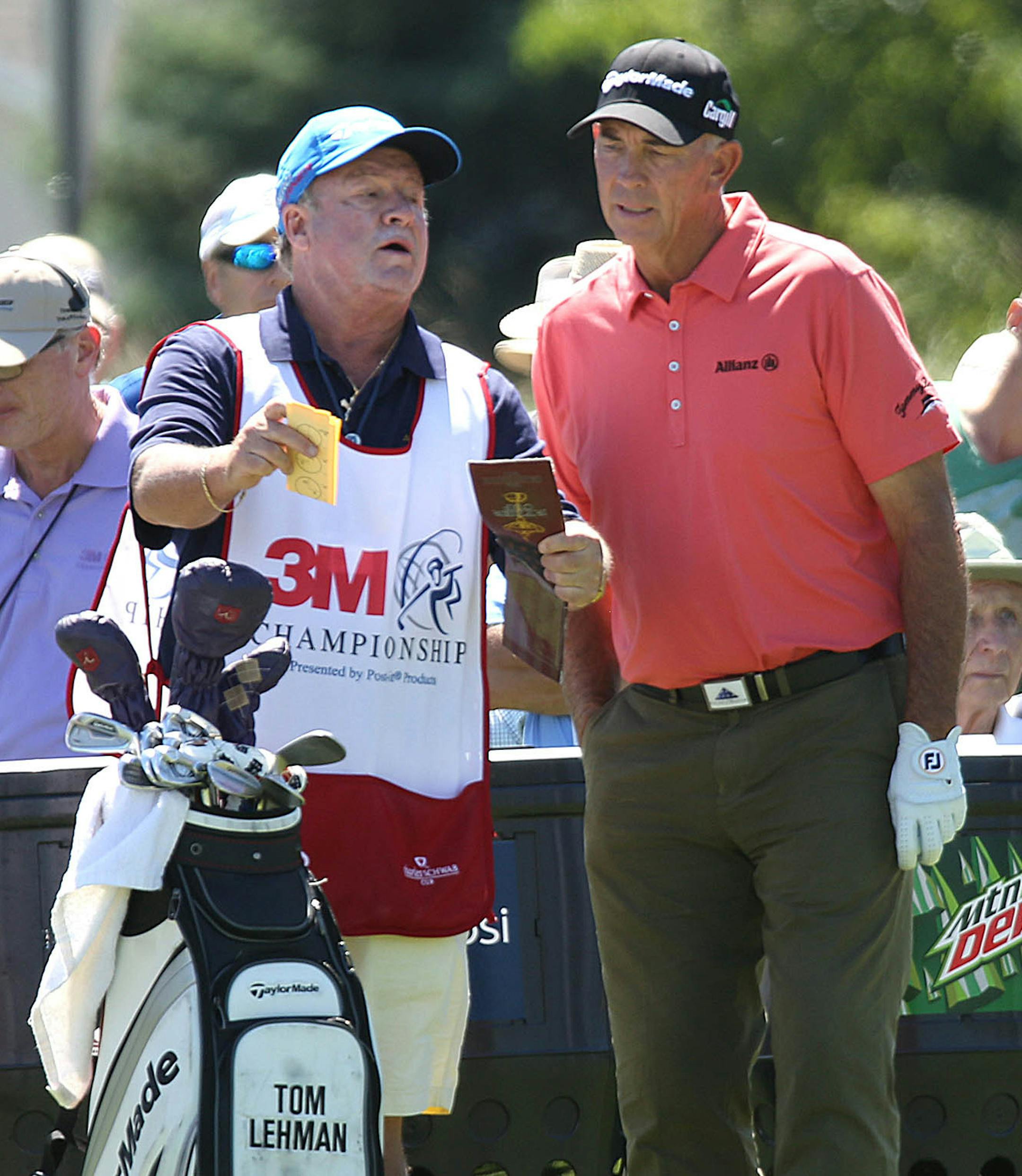 Tom Lehman talked with his caddie, Dennis Trixler.] JIM GEHRZ &#xef; james.gehrz@startribune.com / Blaine, MN / July 31, 2015 / 11:00 AM &#xf1; BACKGROUND INFORMATION: First round action of the 3M Championship golf tournament at TPC Twin Cities in Blaine.