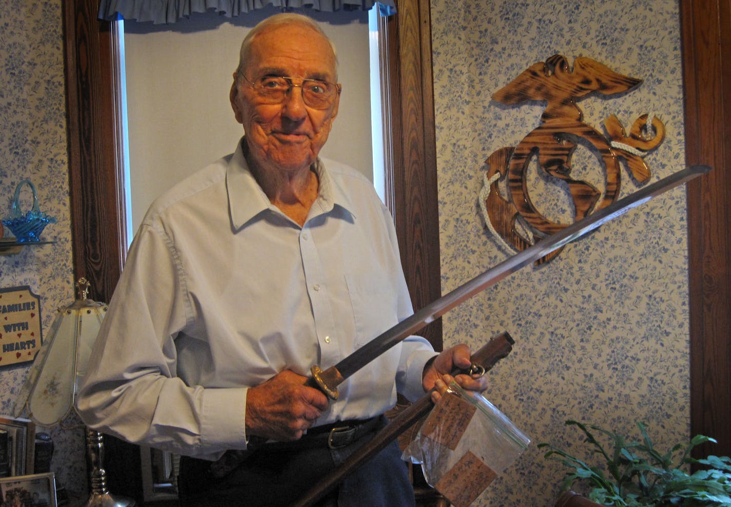 Orval Amdahl, owner of the Japanese sword that he is returning to the grandson of its owner after he had brought it home after World War II. The sword will be returned in a ceremony in St. Paul on Saturday marking International Peace Day. Photo: Jim Adams / Star Tribune 9/17/2013