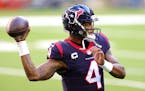 Deshaun Watson #4 of the Houston Texans in action against the Tennessee Titans during a game at NRG Stadium on Jan. 3, 2021 in Houston, Texas. (Carmen