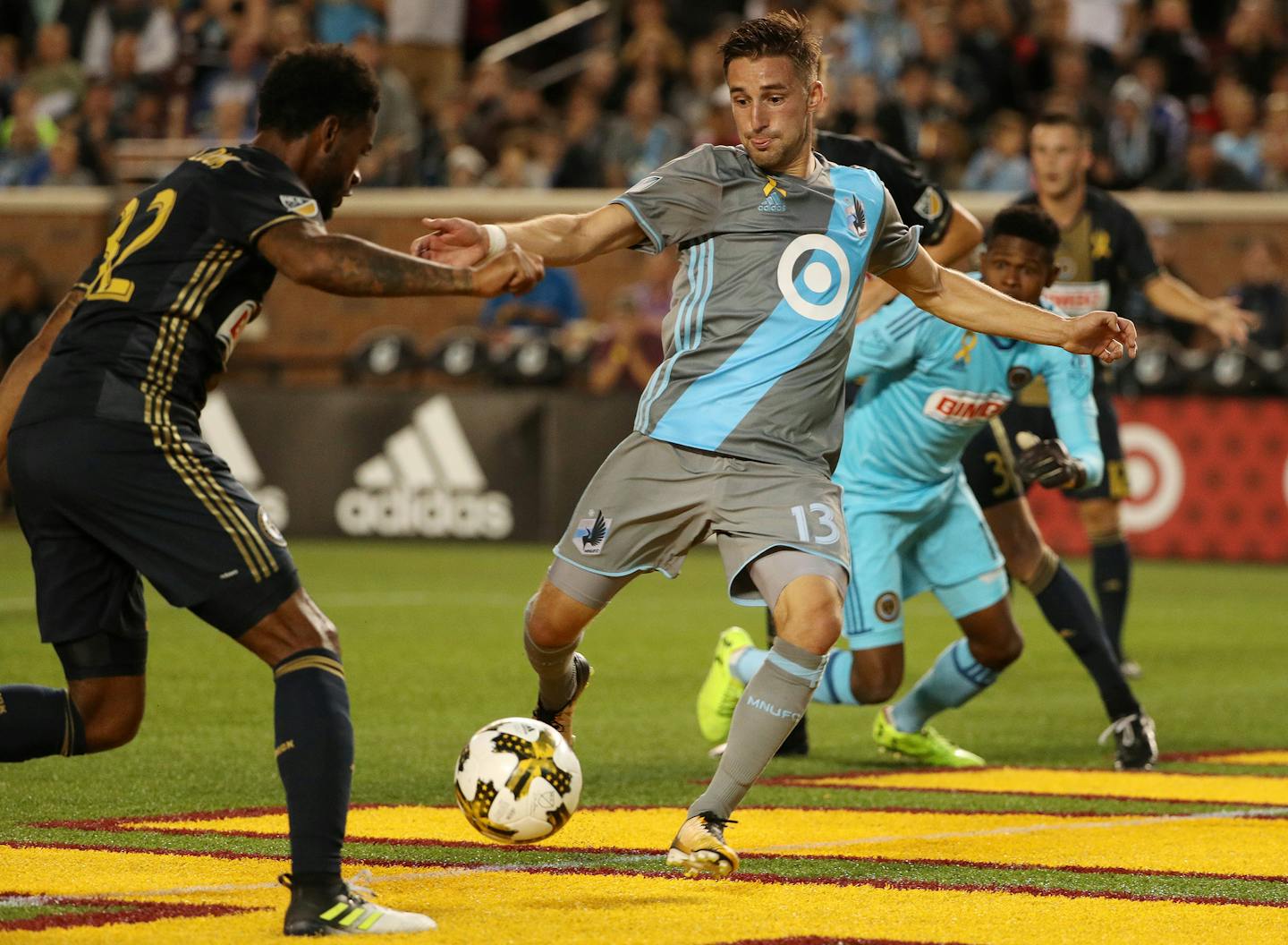 Minnesota United midfielder Ethan Finlay (13) scored past Philadelphia Union defender Giliano Wijnaldum (32) in the first half. ] ANTHONY SOUFFLE &#xef; anthony.souffle@startribune.com Game action from an MLS game between the Minnesota United and the Philadelphia Union Saturday, Sept. 9, 2017 at TCF Bank Stadium in Minneapolis.