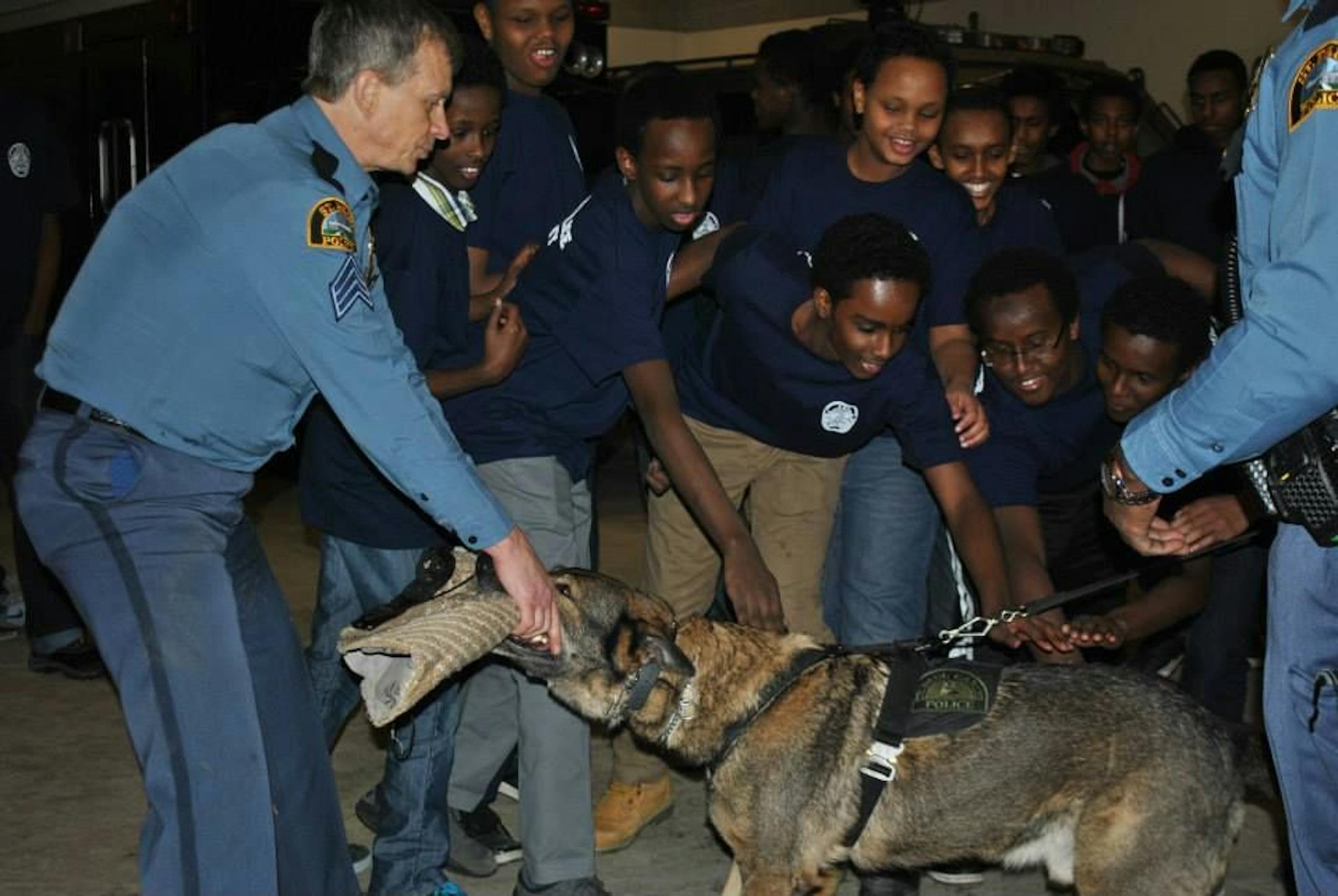 St. Paul junior police academy participants learn about the police's K-9 unit during one of their sessions.