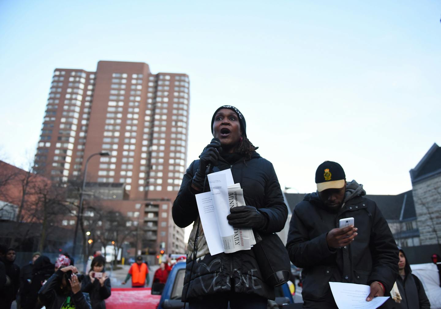 Transgender activist and city council candidate Andrea Jenkins spoke in support of the marchers at Peavey Plaza. ] MARK VANCLEAVE &#x2022; mark.vancleave@startribune.com * About two hundred people marched from Peavey Plaza to City Hall though downtown Minneapolis demanding a $15 minimum wage and more 'sanctuary city' measures to combat President Trump's immigration and deportation policies on Monday, Feb. 27, 2017.