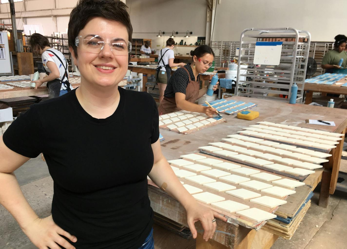 Mercedes Austin, owner of 33-employee Mercury Mosaics of northeast Minneapolis. The Thorp Building-based company operates in a space that, a century ago, was used to make fireproof doors, and later bombsites during World War II. Photo: Neal.St.Anthony@startribune.com