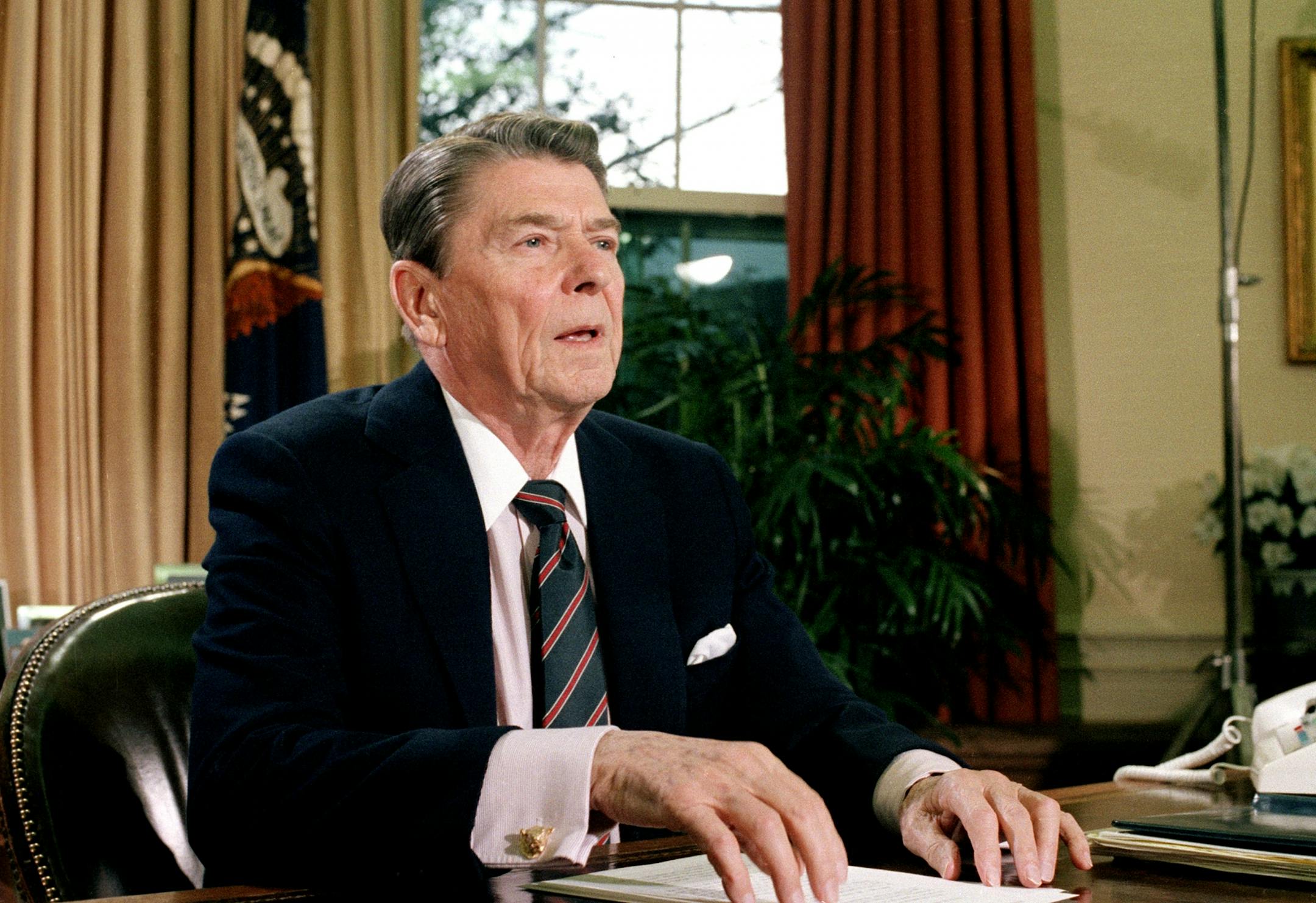 This Jan. 28, 1986 file picture shows U.S. President Ronald Reagan in the Oval Office of the White House after a televised address to the nation about the space shuttle Challenger explosion.