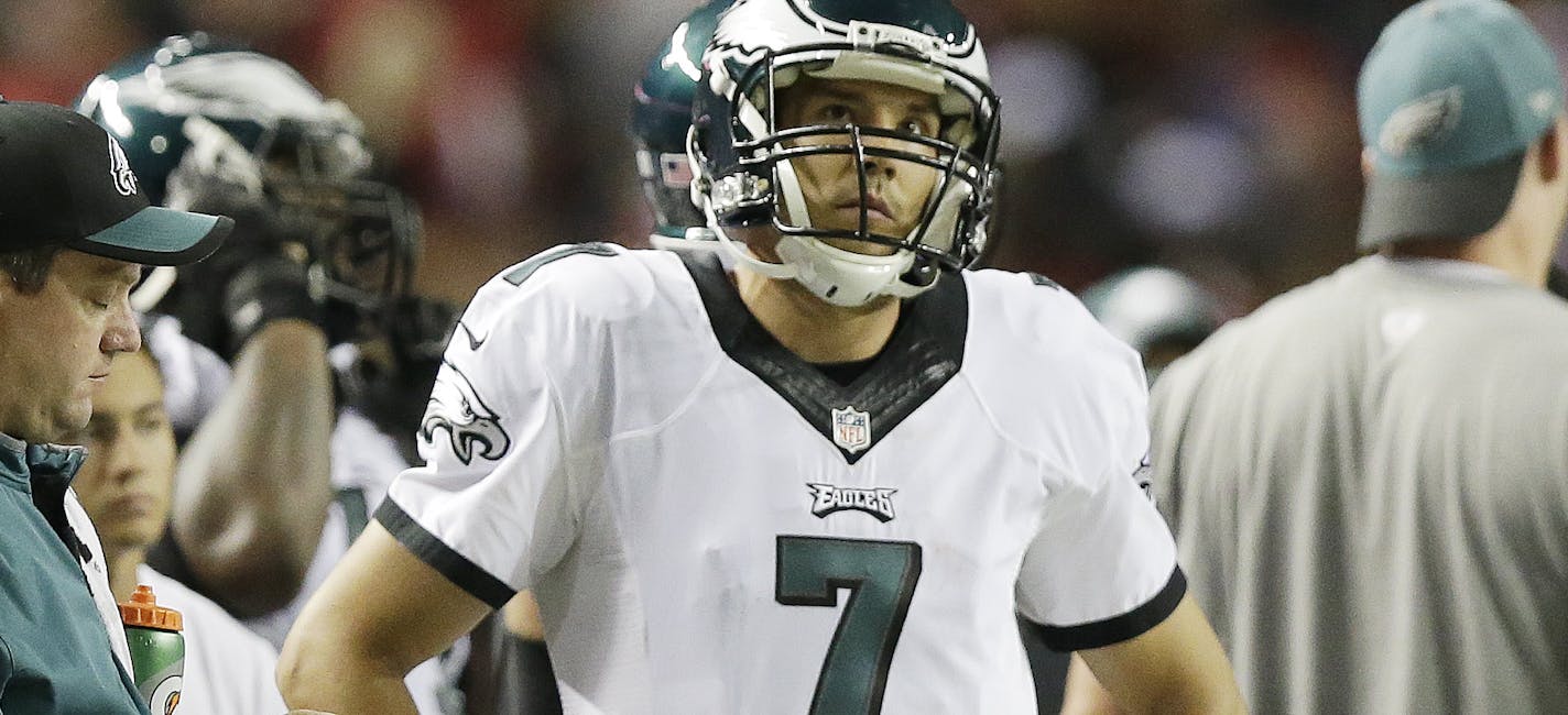 Philadelphia Eagles quarterback Sam Bradford (7) stands on the sidelines during the first half of an NFL football game against the Atlanta Falcons, Monday, Sept. 14, 2015, in Atlanta. (AP Photo/Brynn Anderson)