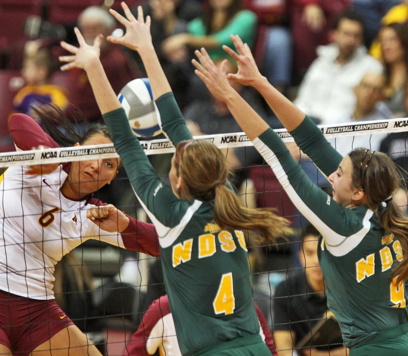 UM Gophers vs. North Dakota State volleyball NCAA tournament. Minnesota won 3-0. Minnesota's Tori Dixon (6) slammed a spike against the NDS defense.