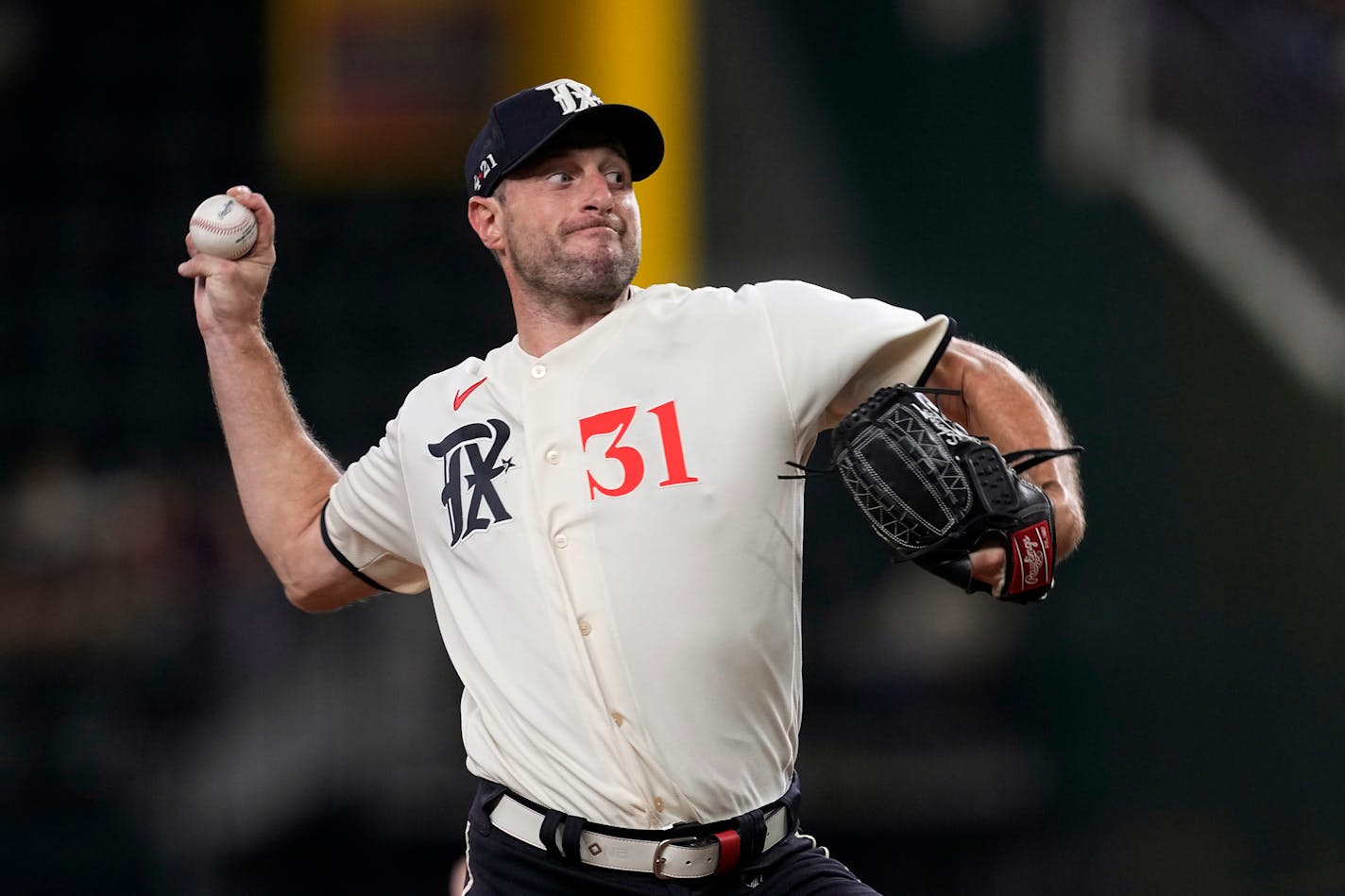 Texas Rangers starting pitcher Max Scherzer throws to a Minnesota Twins batter during the first inning of a baseball game Friday, Sept. 1, 2023, in Arlington, Texas. (AP Photo/