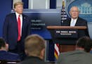 Secretary of Agriculture Sonny Perdue, right, speaks as President Donald Trump looks on during the daily briefing of the White House Coronavirus Task 