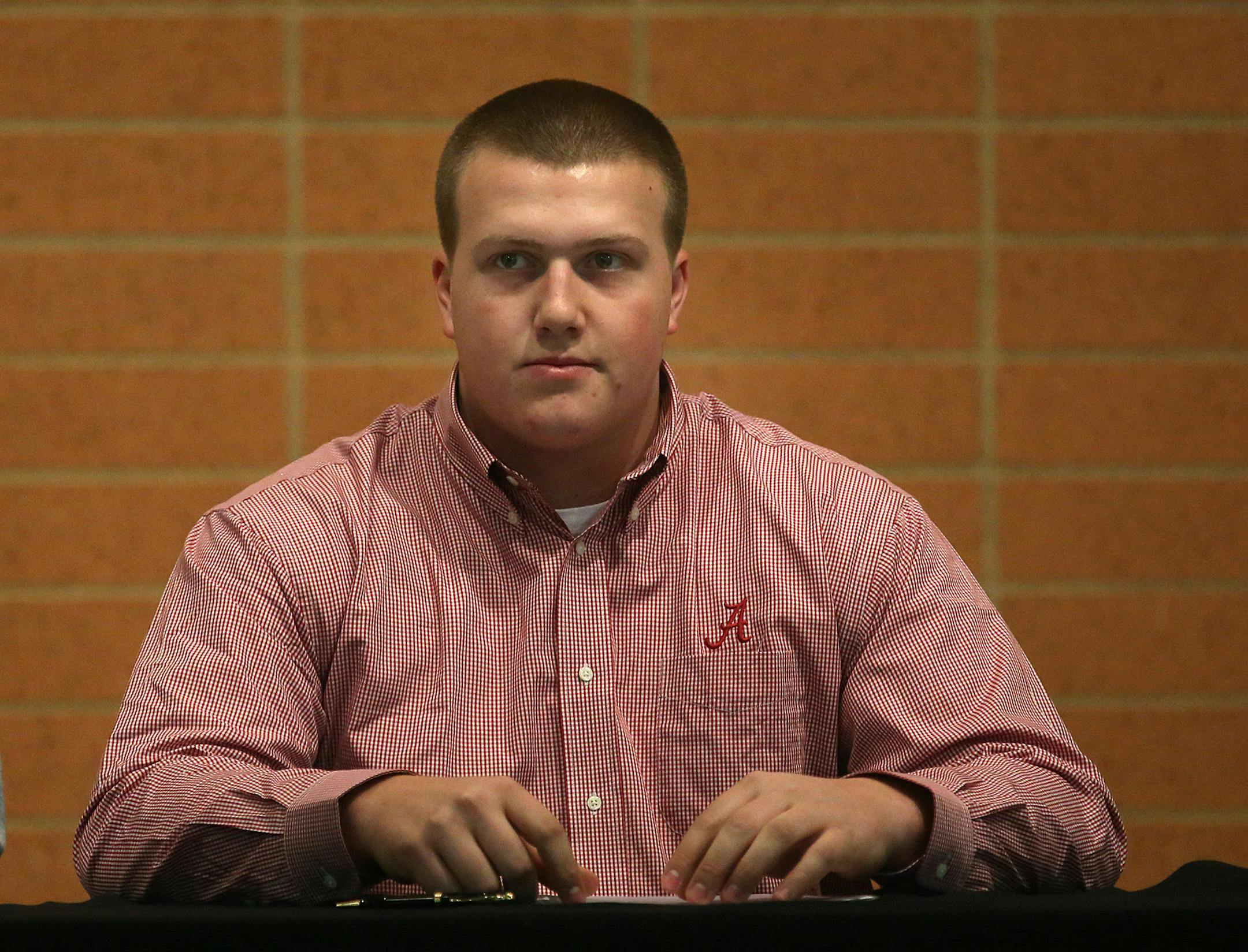 J.C. Hassenauer (football) prepared to sign his national letter of intent to attend Alabama during a ceremony at East Ridge High School in Woodbury. ] JIM GEHRZ ‚Ä¢ jgehrz@startribune.com / Woodbury, MN / February 5, 2014 / 7:45 AM BACKGROUND INFORMATION: A ceremony was held at East Ridge High School to sign national letters of intent for several students: Bailey Ness, Track, University of Minnesota; Jaden Vogelgesang, Soccer, Mankato; J.C. Hassenauer, Football, Alabama; George
