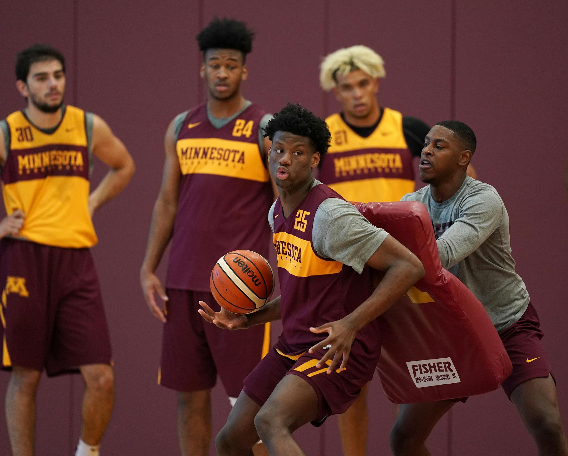Minnesota Golden Gophers center Daniel Oturu (25) took part in a drill during Thursday's practice. ] ANTHONY SOUFFLE &#x2022; anthony.souffle@startribune.com The University of Minnesota Gophers men's basketball team held an open practice Thursday, Aug. 1, 2019 at the Bierman Field Athletic Building in Minneapolis before leaving for Italy.