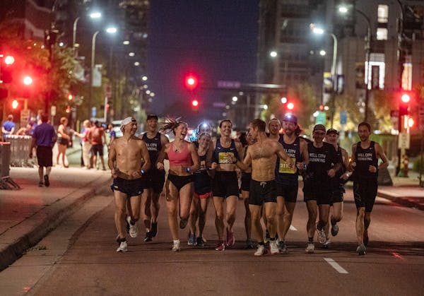 Runners warmed up and and decided to run their own racet the start of the 10-mile in Minneapolis, Minnesota, on Sunday, Oct. 1, 2023. The Twin Cities 