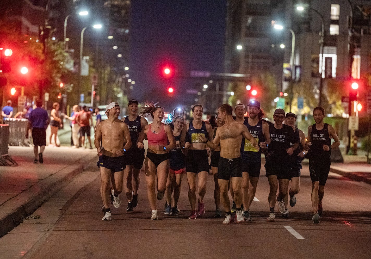 Runners warmed up and and decided to run their own racet the start of the 10-mile in Minneapolis, Minnesota, on Sunday, Oct. 1, 2023. The Twin Cities Marathon and 10 mile race were canceled today due to a heat and humidity conditions.] RICHARD TSONG-TAATARII • richard.tsong-taatarii@startribune.com ORG XMIT: MIN2310011114130022