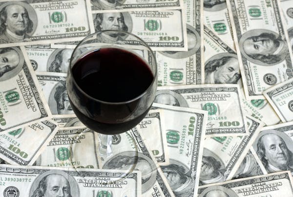 As tax season winds down, no need to break the bank when buying wine. Credit: istock