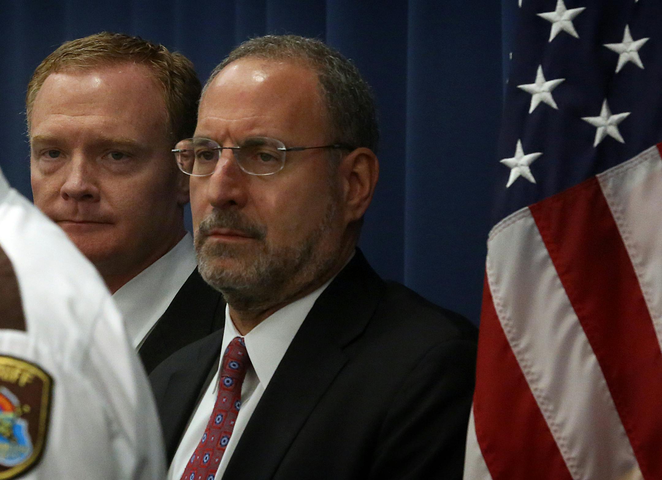 Hennepin County Sheriff Richard Stanek (left) spoke at the news conference. U.S. Attorney Andrew Luger (right), and Special Agent in Charge ATF-St. Paul Field Division James Modzelewski (second from left) were among those attending the news conference. ] JIM GEHRZ ‚Ä¢ james.gehrz@startribune.com / Minneapolis, MN / November 21, 2014 /10:00 A ‚Äì BACKGROUND INFORMATION: The Hennepin County Sheriff‚Äôs Office, U.S. Attorney‚Äôs Of