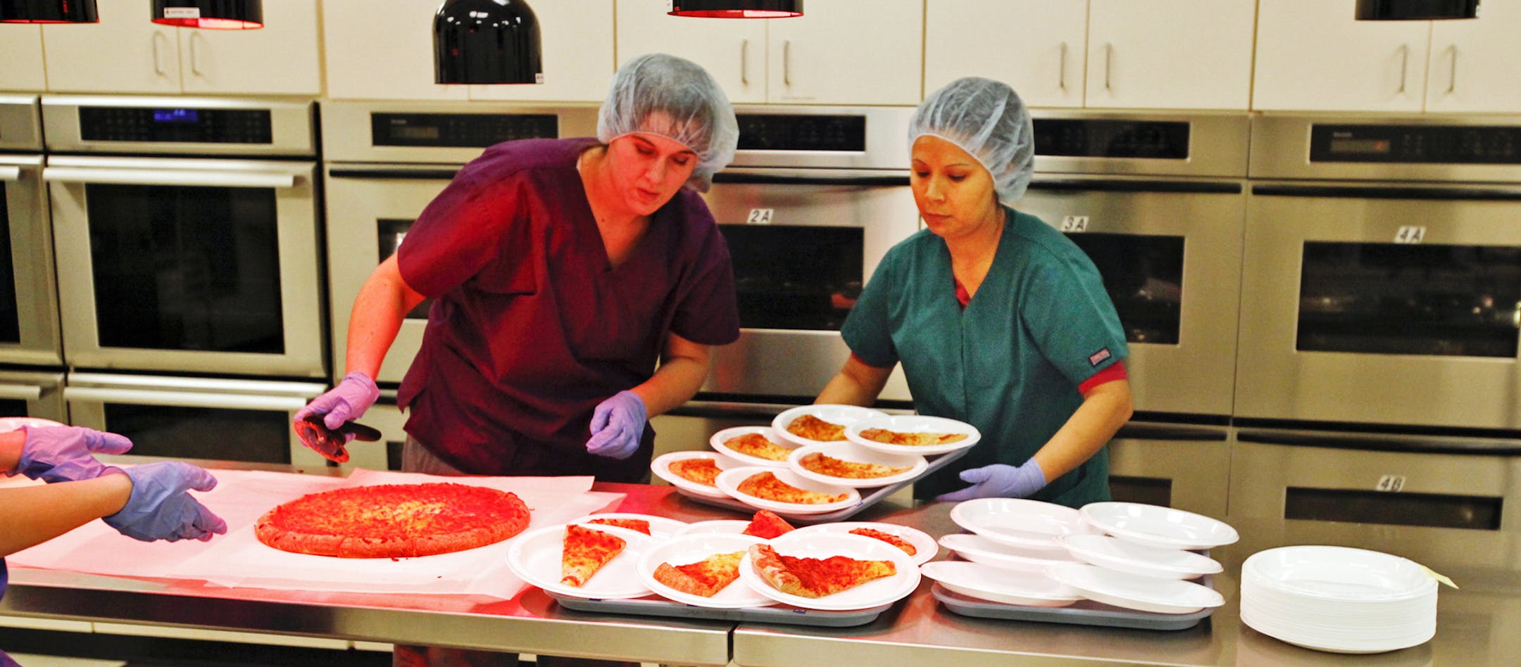 DAVID JOLES ‚Ä¢ djoles@startribune.com -March, 1, 2011- Marshall, MN- New dietary guidelines - which call for healthier foods -for school lunch will effect the companies that are big school lunch suppliers. Schwan's Foods is the country's biggest provider of pizzas to school lunch programs. On this day, their R & D department tested a 51 percent whole grain pizza on a group of more than 40 Marshall Area Public Schools students during a blind taste test. In this photo:] Schwan's