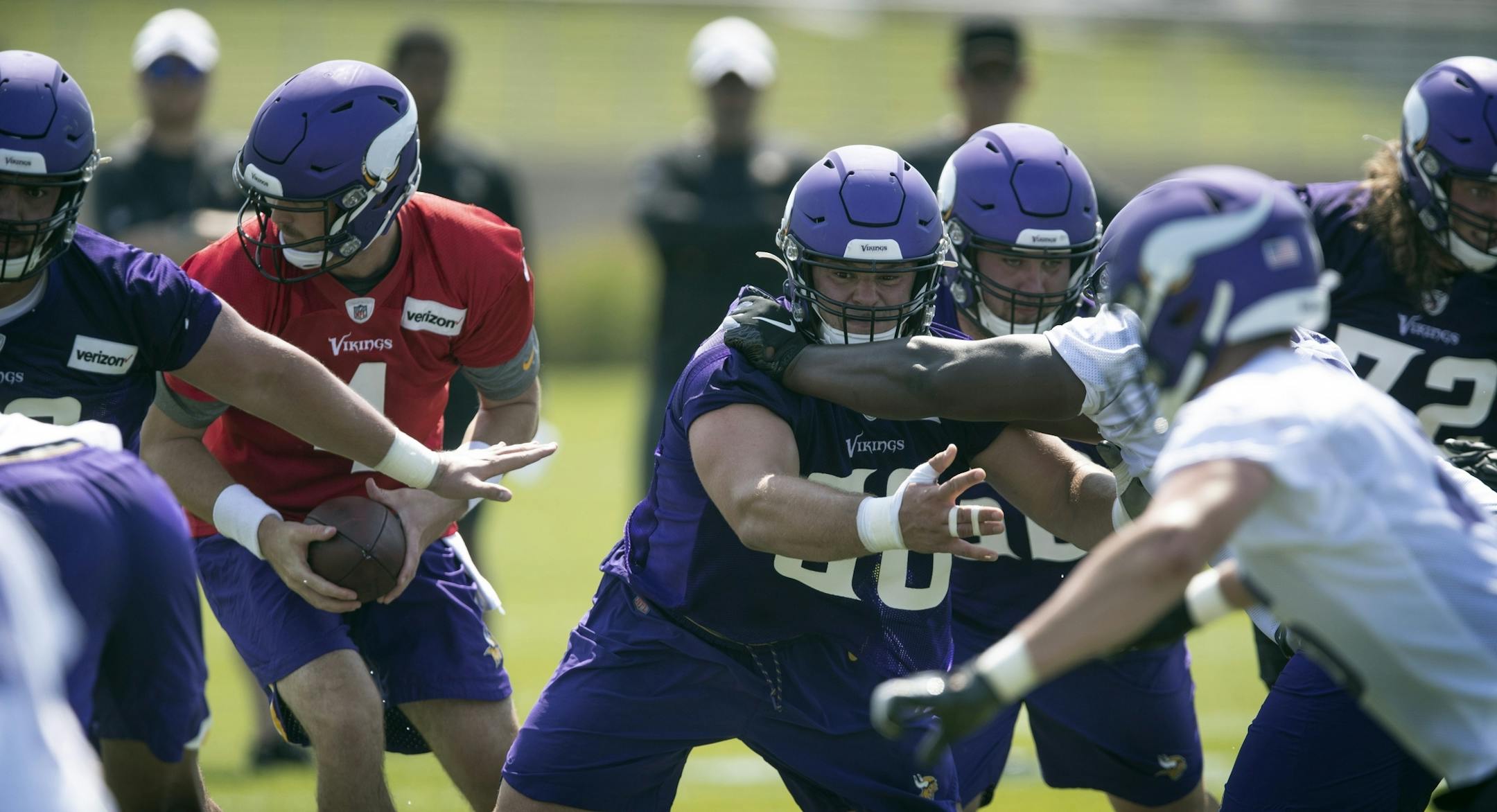 Rookie center Garrett Bradbury blocked after hiking he ball during the first day of training for Vikings rookies at TCO Performance Center Tuesday July,23 2019 in Eagan, MN.