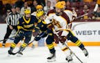 Gophers forward John Mittelstadt guides the puck against Michigan at 3M Arena at Mariucci on Friday.