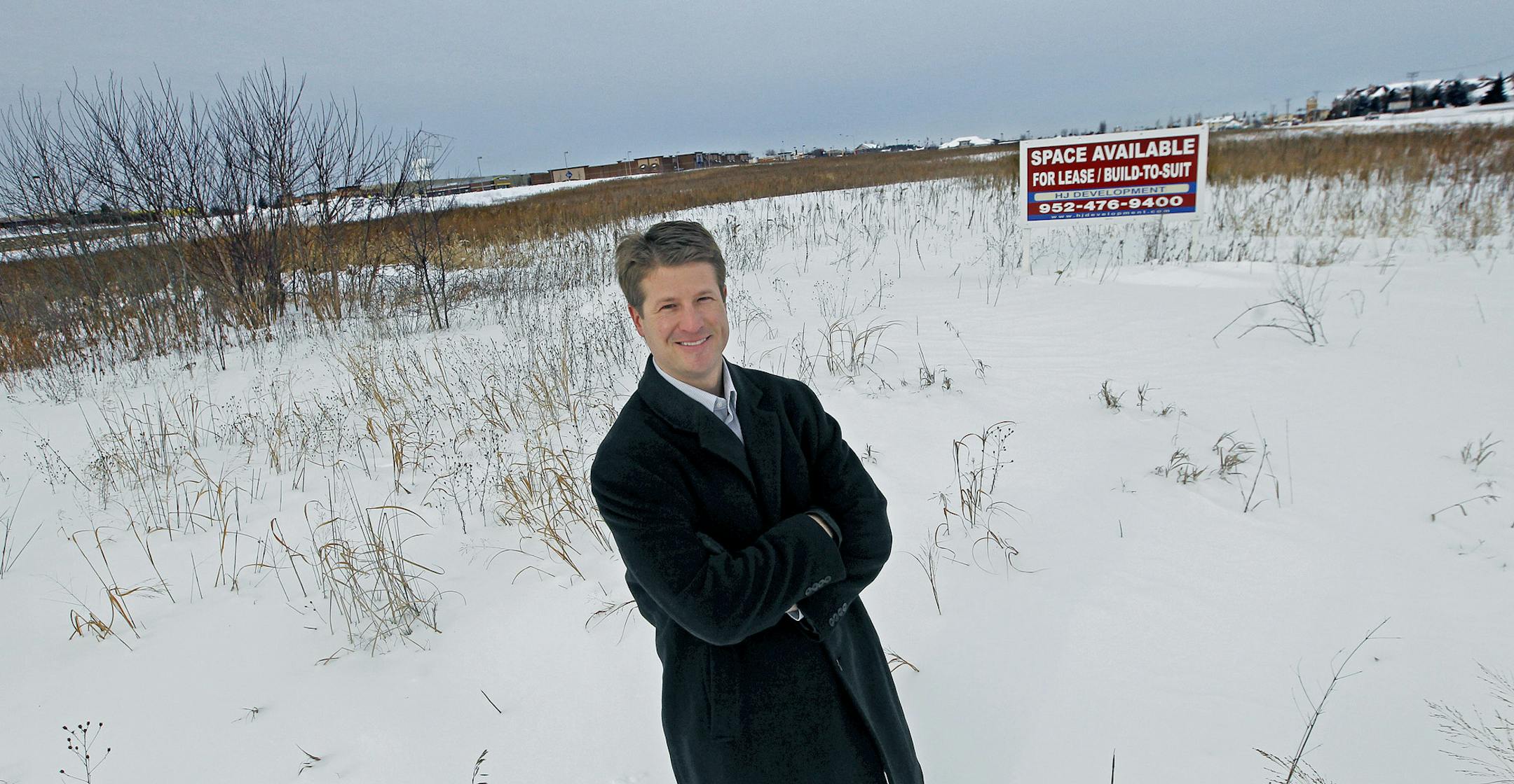 Chris Moe of HJ Development stood at the site where a new retail/commercial development called Woodbury Plaza is starting to make its way through the city approval process, Wednesday, January 15, 2014 in Woodbury, MN. (ELIZABETH FLORES/STAR TRIBUNE) ELIZABETH FLORES • eflores@startribune.com