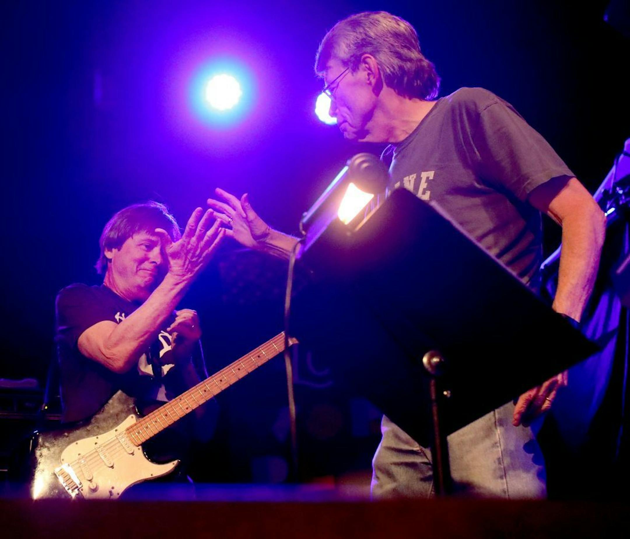 The Rock Bottom Remainders--including literary giants Stephen King, Amy Tan, Dave Barry and other writers--kicked off the Wordplay Festival Friday, May 10, 2019, at First Avenue in Minneapolis, MN. Here, band mates Dave Barry, left, and Stephen King exchanged hi-fives while King walked onto the stage at First Avenue. Between band members, they've published more than 150 titles and sold more than 350 million books.
