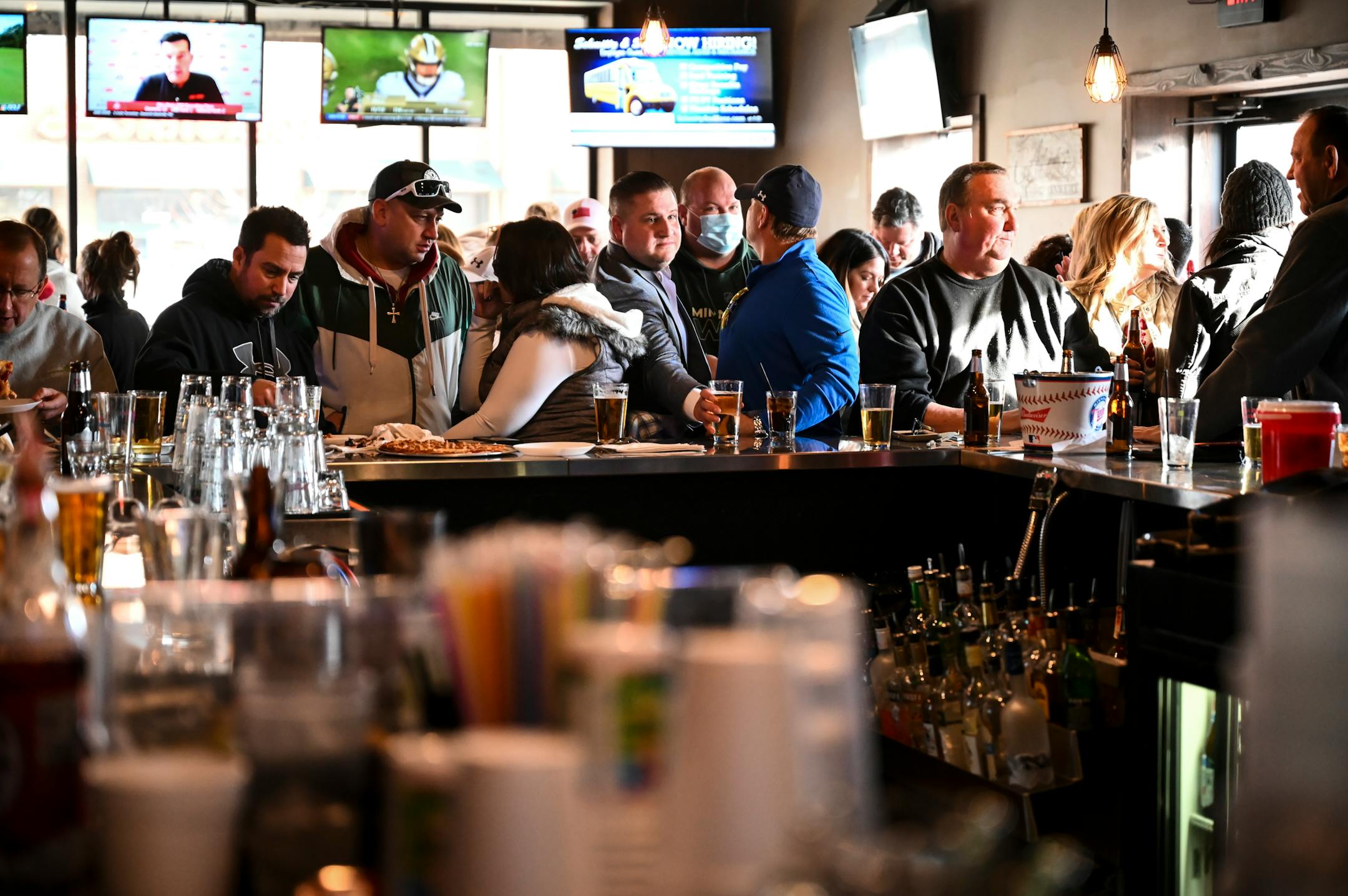 Standing-room only at the bar at Alibi Drinkery in Lakeville, which reopened Wednesday morning in defiance of Gov. Walz.