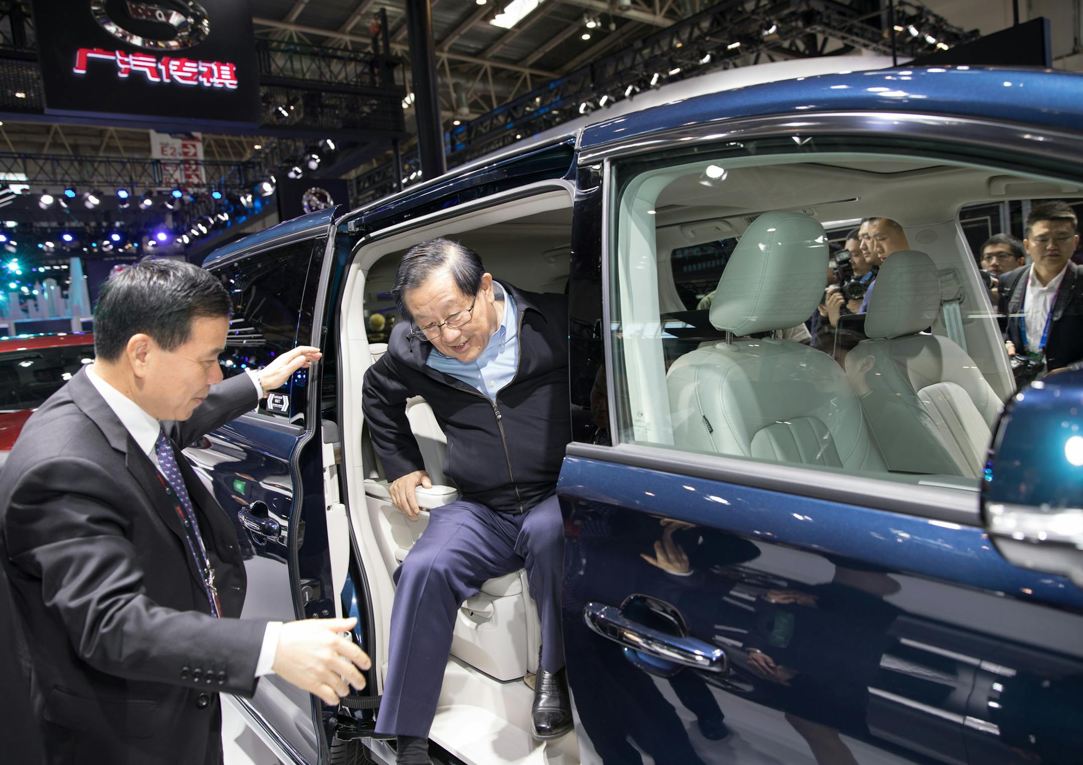 Wan Gang, Minister of Science and Technology, center, visits the stand of Guangzhou Automobile Group Motor (GAC) during the 15th Beijing International Automotive Exhibition, also known as Auto China 2018, in Beijing, China, 25 April 2018. 2018 Beijing International Automotive Exhibition (Auto China 2018) took place at China International Exhibition Center New Venue and China International Exhibition Center Old Venue simultaneously in April 2018, with total exhibition area expected to be 220,000