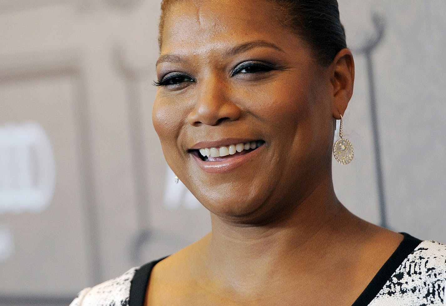 FILE - This Oct. 5, 2012 file photo shows Queen Latifah at Variety's 4th annual Power of Women event in Beverly Hills, Calif. Latifah's new talk show, "The Queen Latifah Show" comes out from Sony Pictures Television in September 2013. (Photo by Chris Pizzello/Invision/AP, file) ORG XMIT: MIN2013090414564150