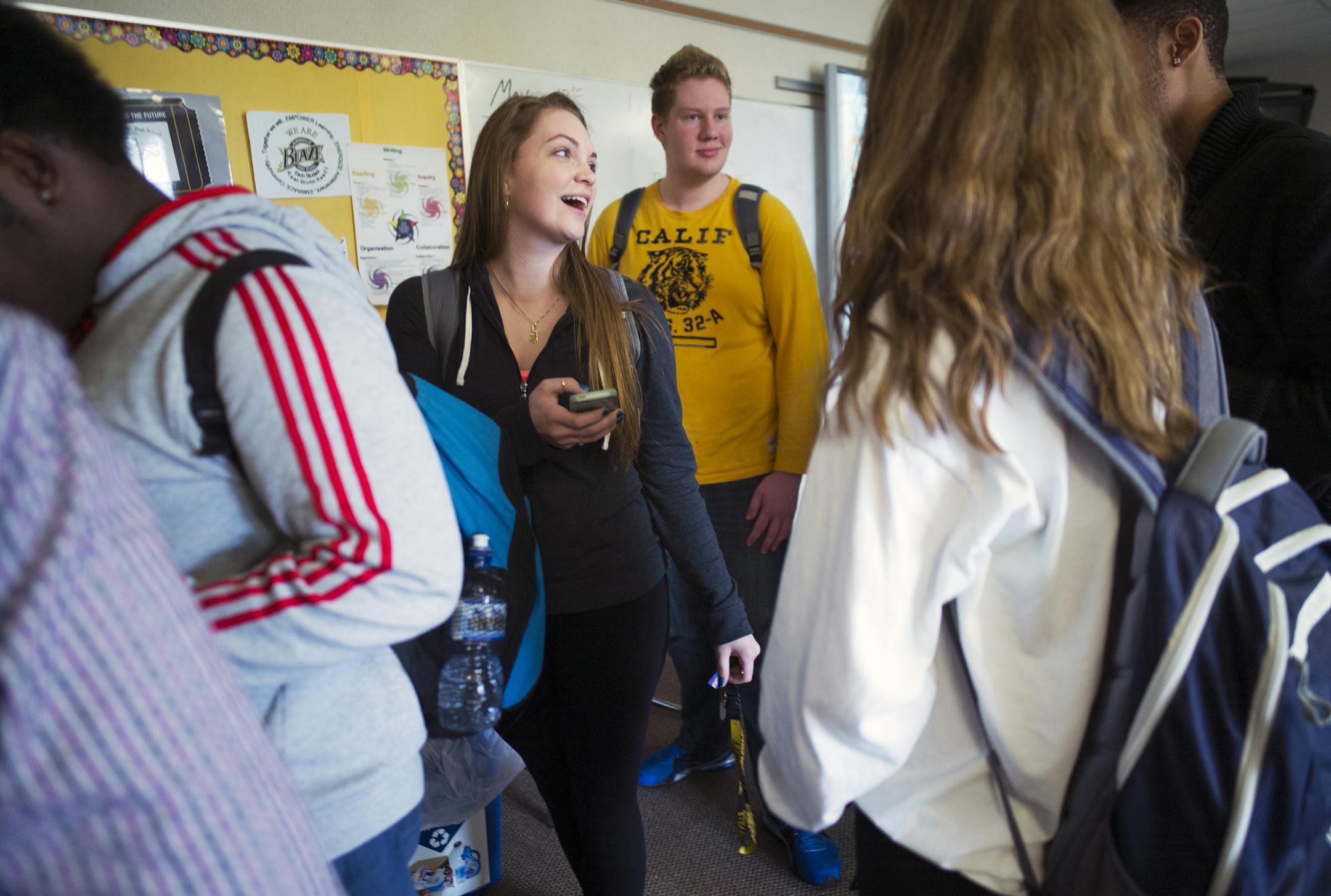 At the Burnsville H.S. senior campus which is scheduled to close, Paige McDonald(center) prepares to head out at the end of american literature class .] Richard Tsong-Taatarii/rtsong-taatarii@startribune.com