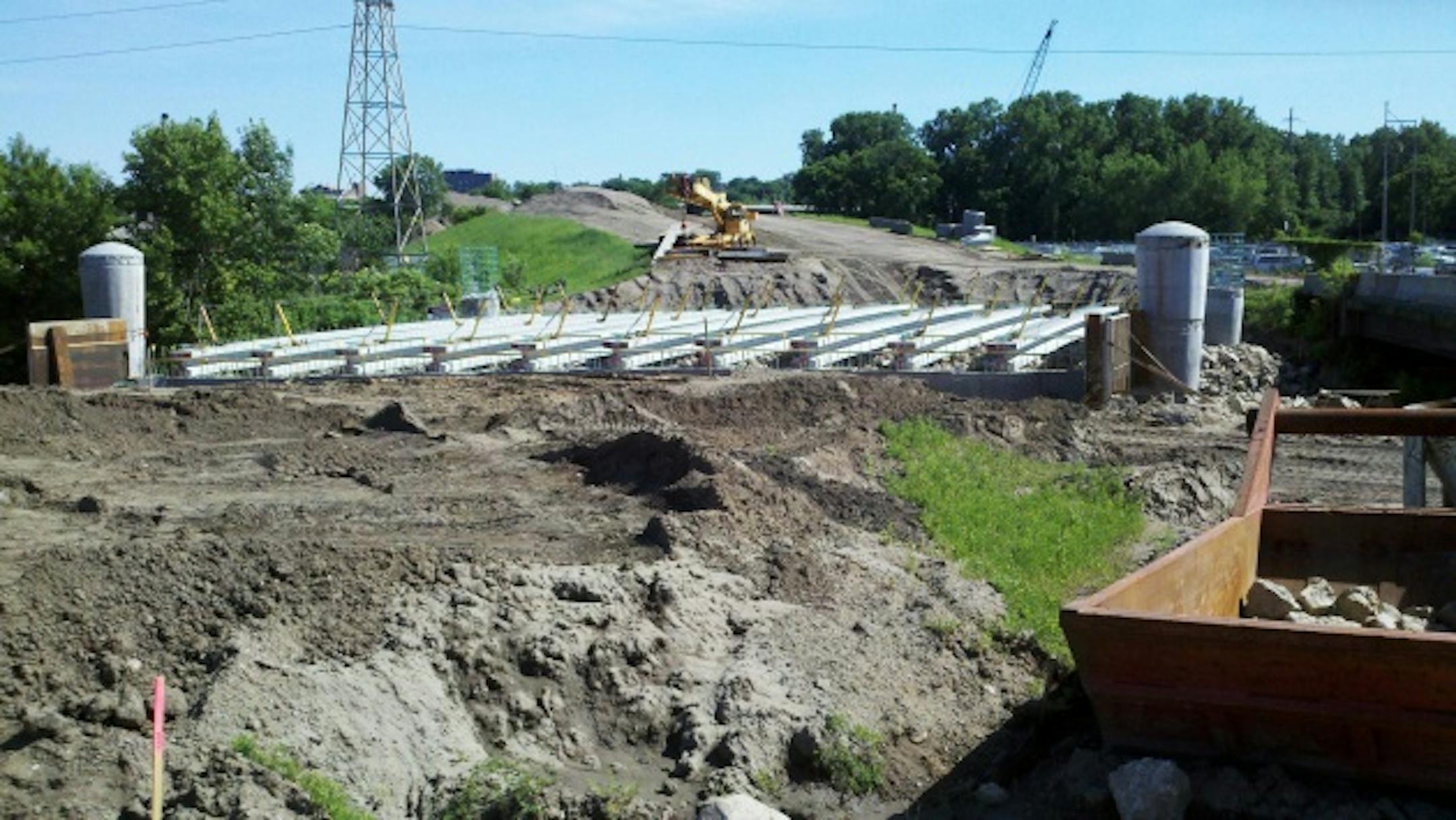 This partially finished bridge over Bassett Creek will carry Van White Boulevard.