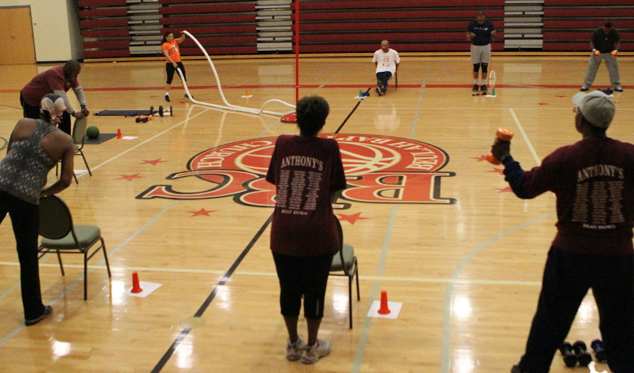 An exercise group of baby boomers works out together at the Beulah Baptist Church Family Life Center in Decatur, Georgia