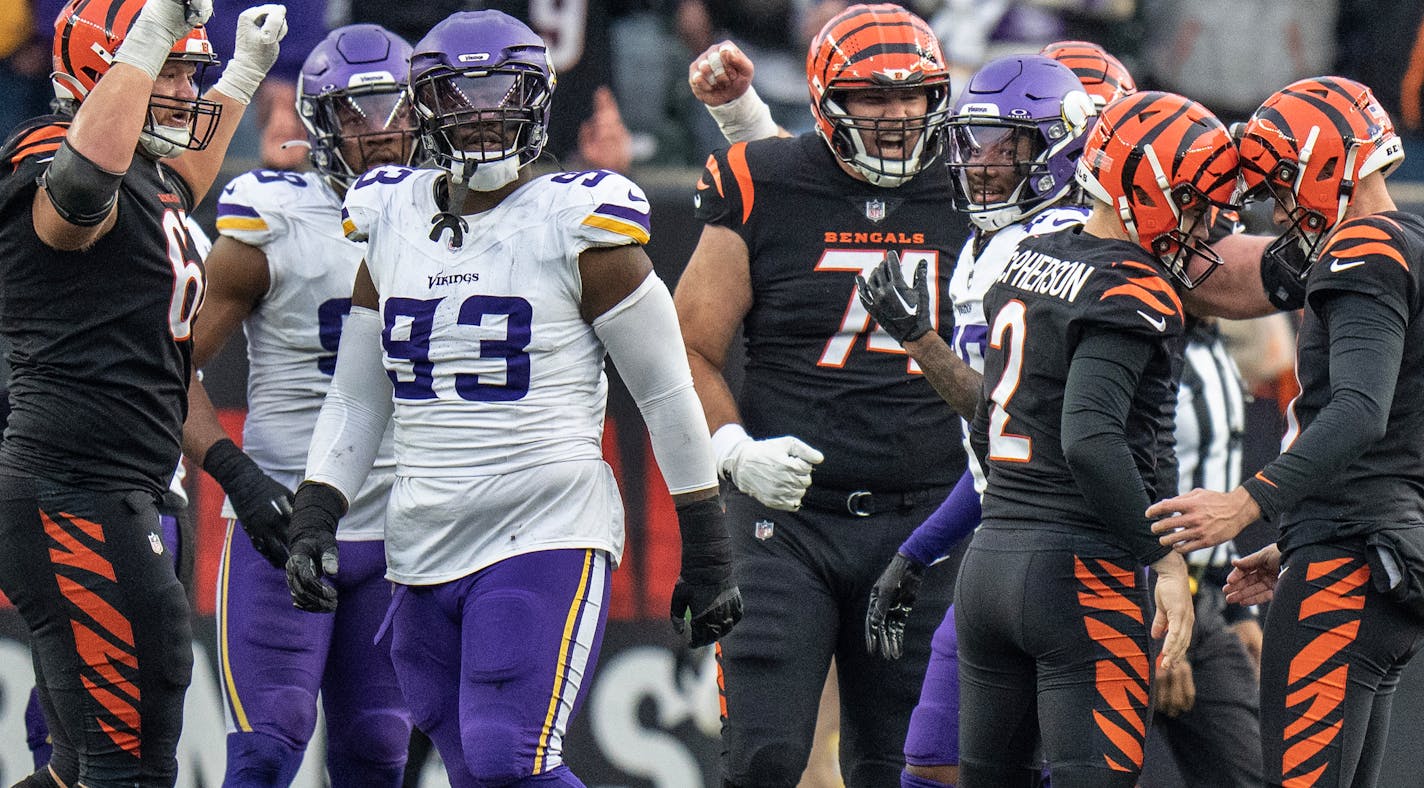 Cincinnati Bengals place kicker Evan McPherson (2) celebrates with holder Brad Robbins (10) after kicking the winning 29 yard overtime field goal defeating the Minnesota Vikings 27-24 Saturday December ,16 ,2023 in,Cincinnati, OH. ] JERRY HOLT • jerry.holt@startribune.com