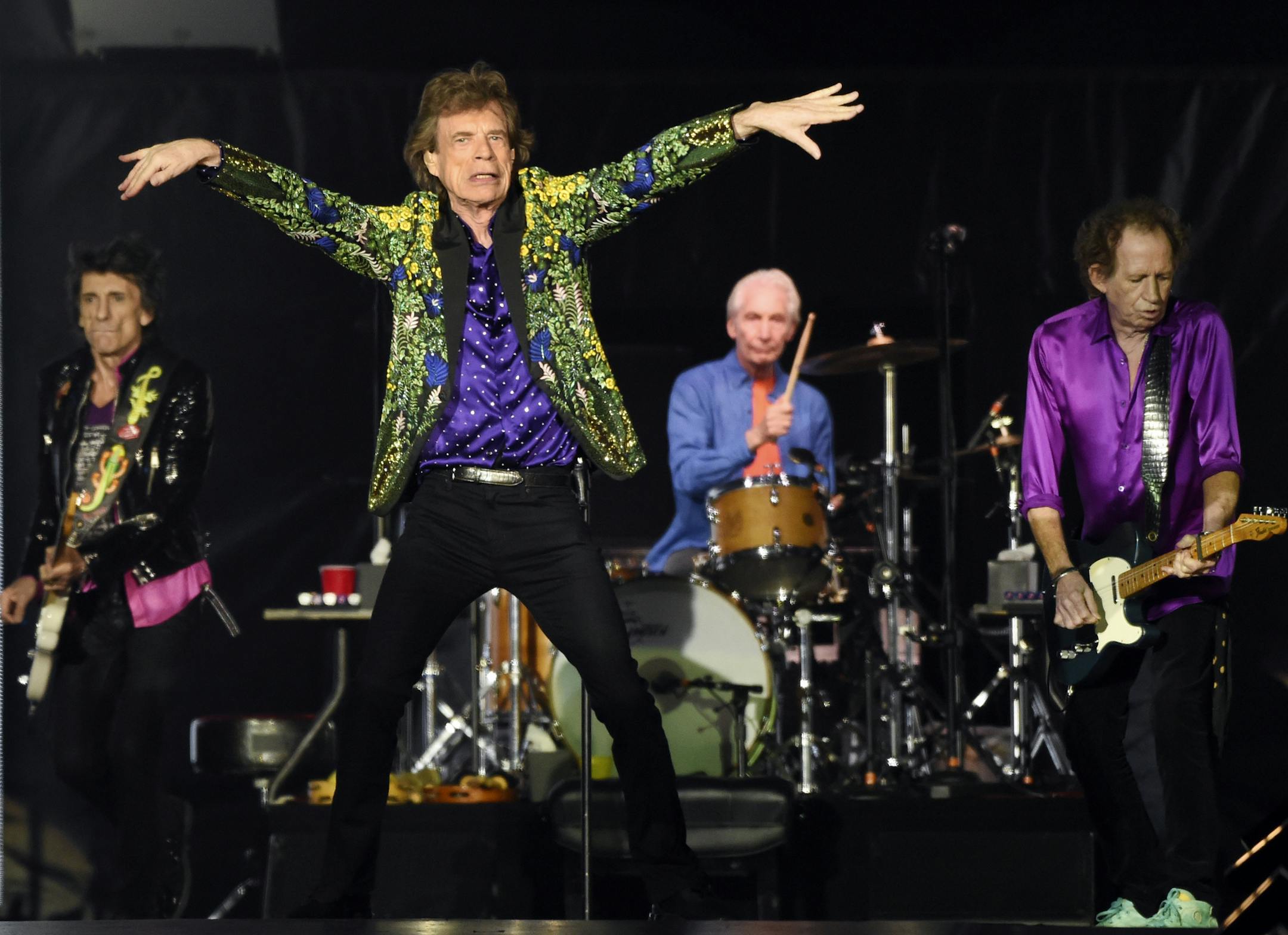 FILE - Ron Wood, from left, Mick Jagger, Charlie Watts and Keith Richards of the Rolling Stones perform during their concert in Pasadena, Calif. The Rolling Stones are releasing a new version of their 1973 album "Goats Head Soup" with three unheard tracks. One of the new tracks is called "Scarlet" and features Led Zeppelin guitarist Jimmy Page. The album coming out on Sept. 4, 2020 will have a four-disc CD and vinyl box set edition with ten bonus tracks. The Stones also released a video for one