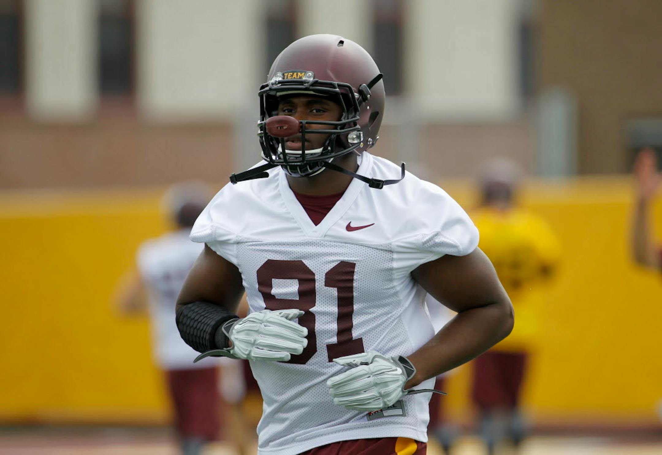 Minnesota tight end Duke Anyanwu (81) takes part in NCAA college football training camp in Minneapolis Friday, Aug. 7, 2015. (AP Photo/Ann Heisenfelt)