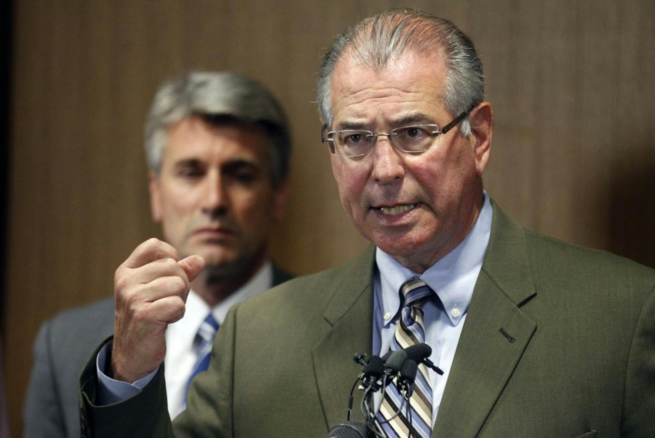 Said Hennepin County Attorney Mike Freeman: "Anybody who says 'I don't want to come forward, I don't want to get involved, I'll take care of it myself' — that isn't an answer." Behind him was Mayor R.T. Rybak.