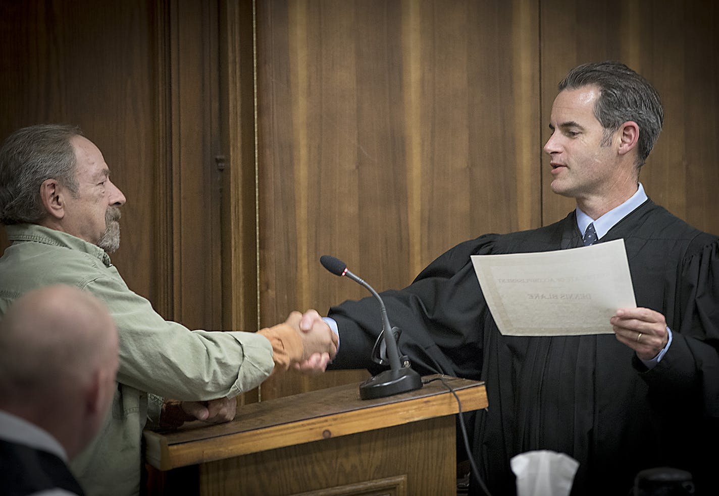 Judge Shaun Floerke offered up a little hands-on treatment with defendant Dennis Blake during a South St. Louis County DWI Court session.